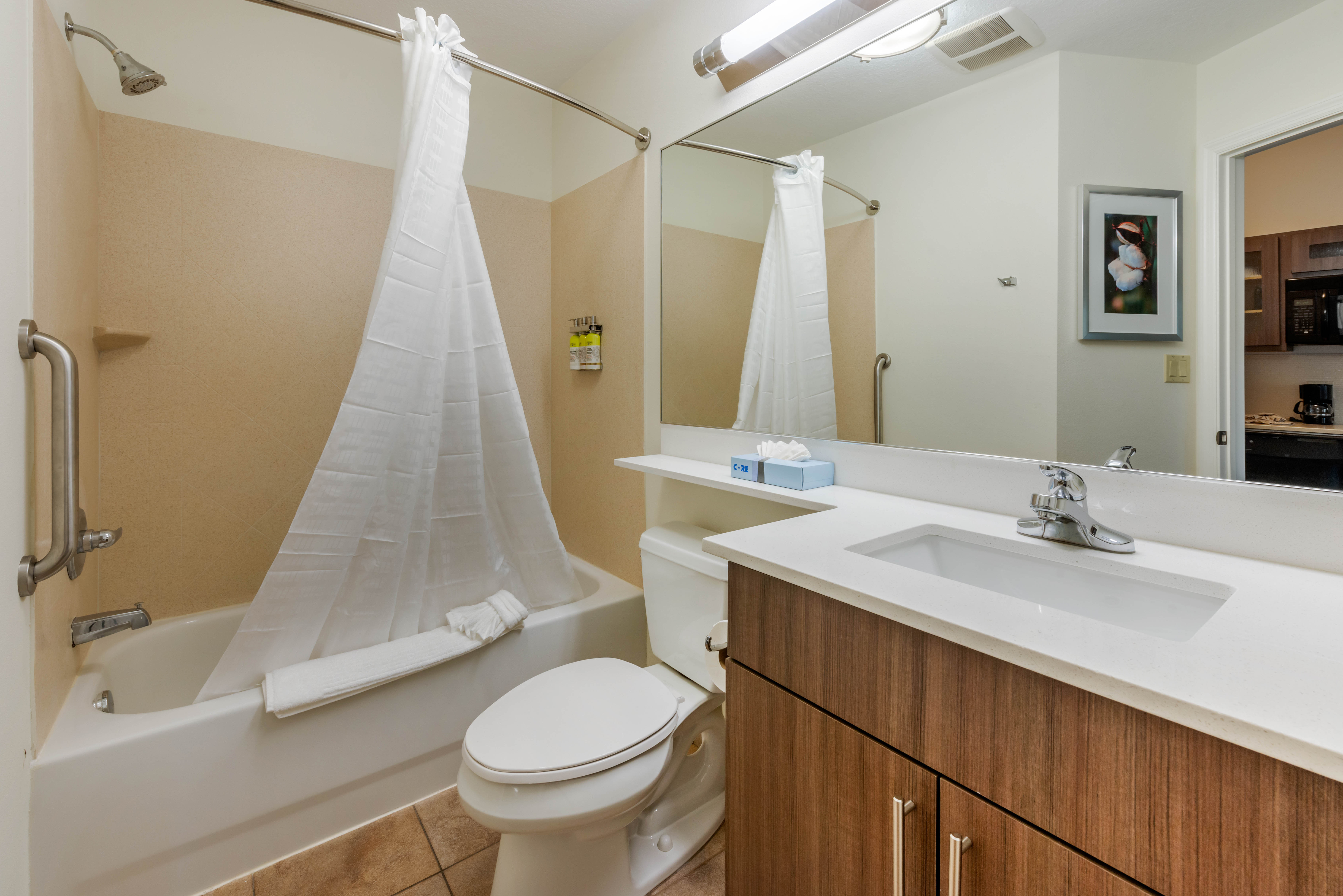 CANDLEWOOD STES FT MYERS SANIB BY I-guestroom-Relax in our spacious Guest Bathroom with ADA/Handicap access..jpg