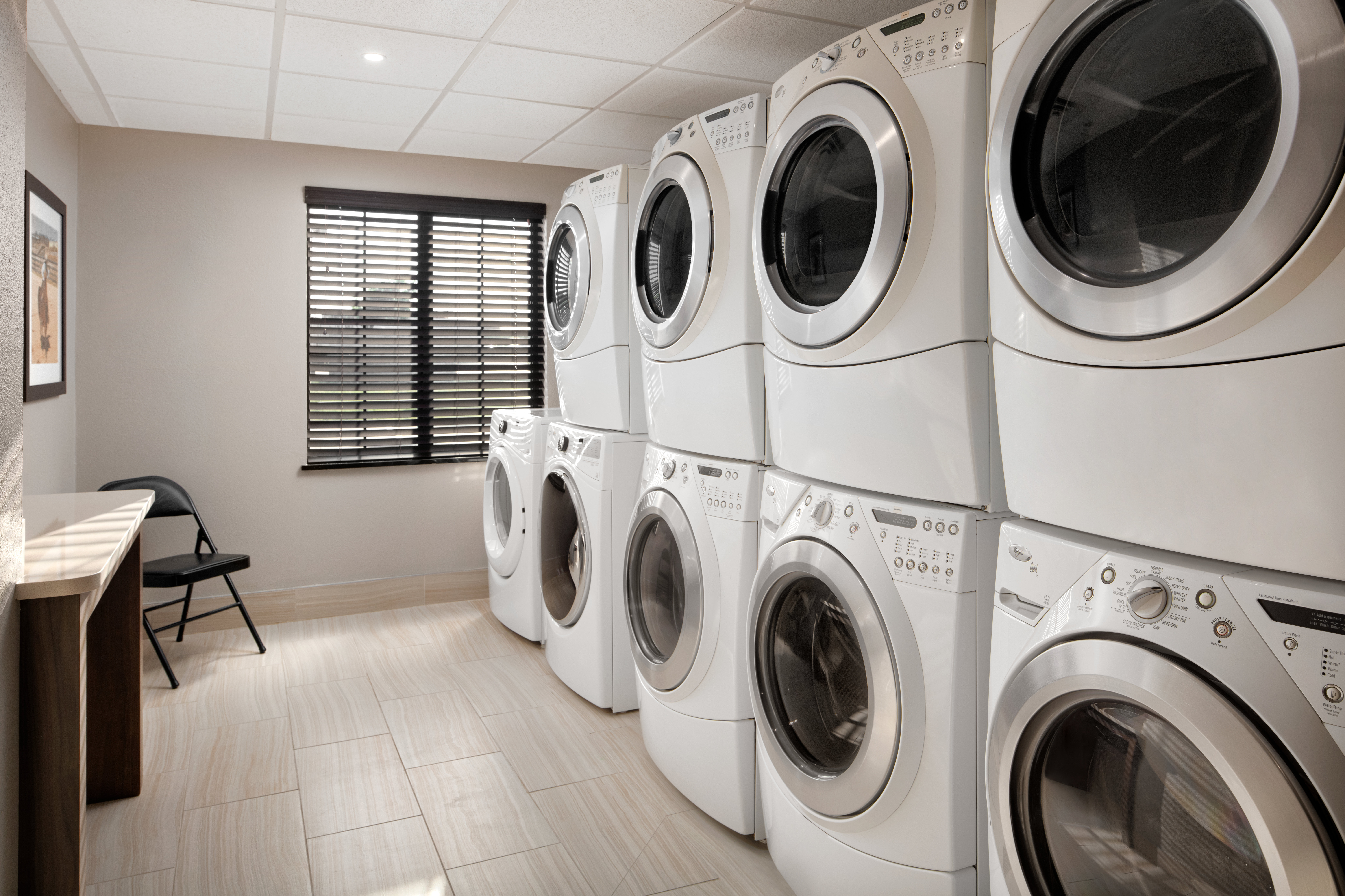 STAYBRIDGE STES WEST FT. WORTH BY I-guestroom-Keep it clean with our Guest Complimentary Laundry room open 24hrs.jpg