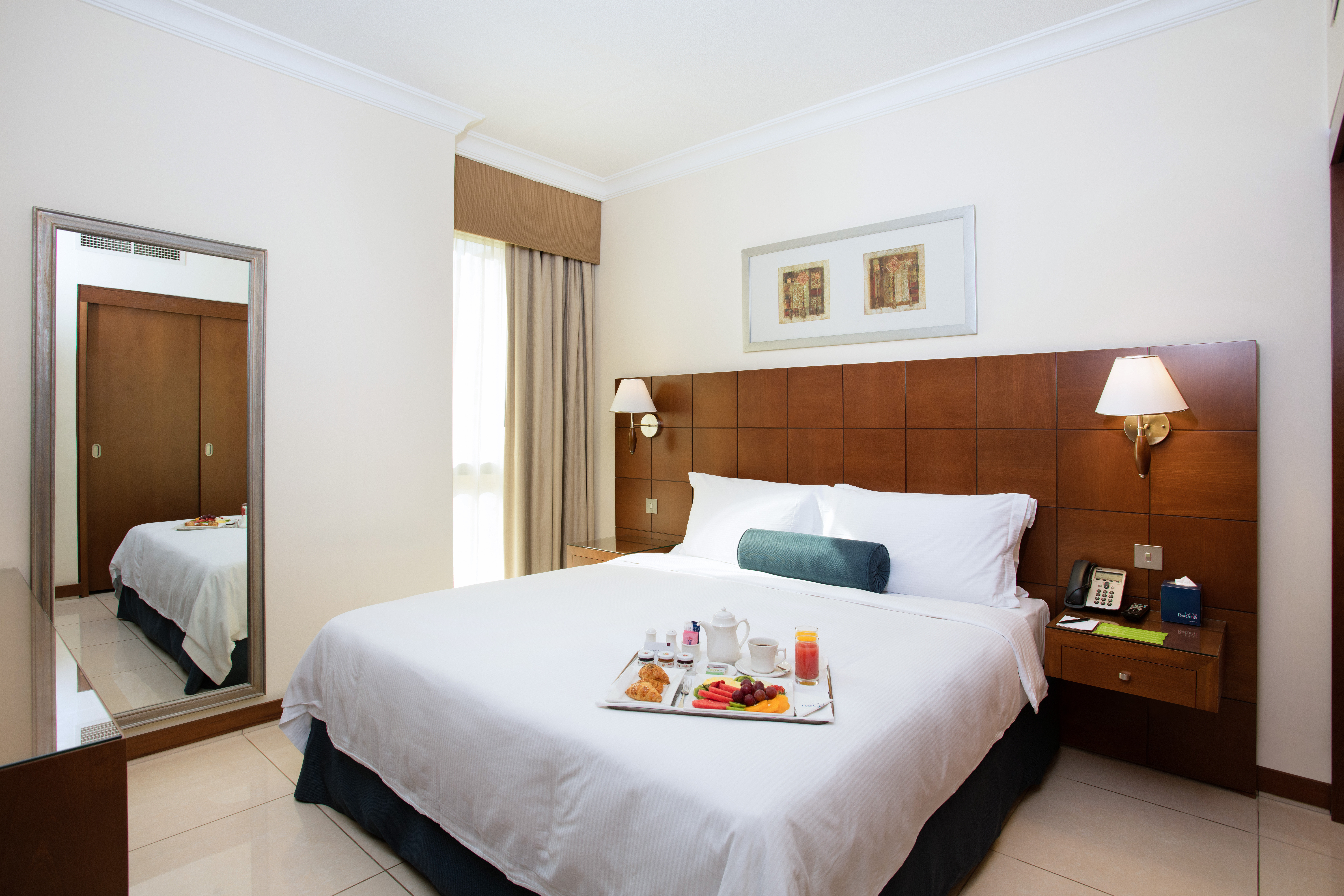 Al Rawda Arjaan by Rotana-guestroom-City View One Bedroom Suite – King Bed.jpg