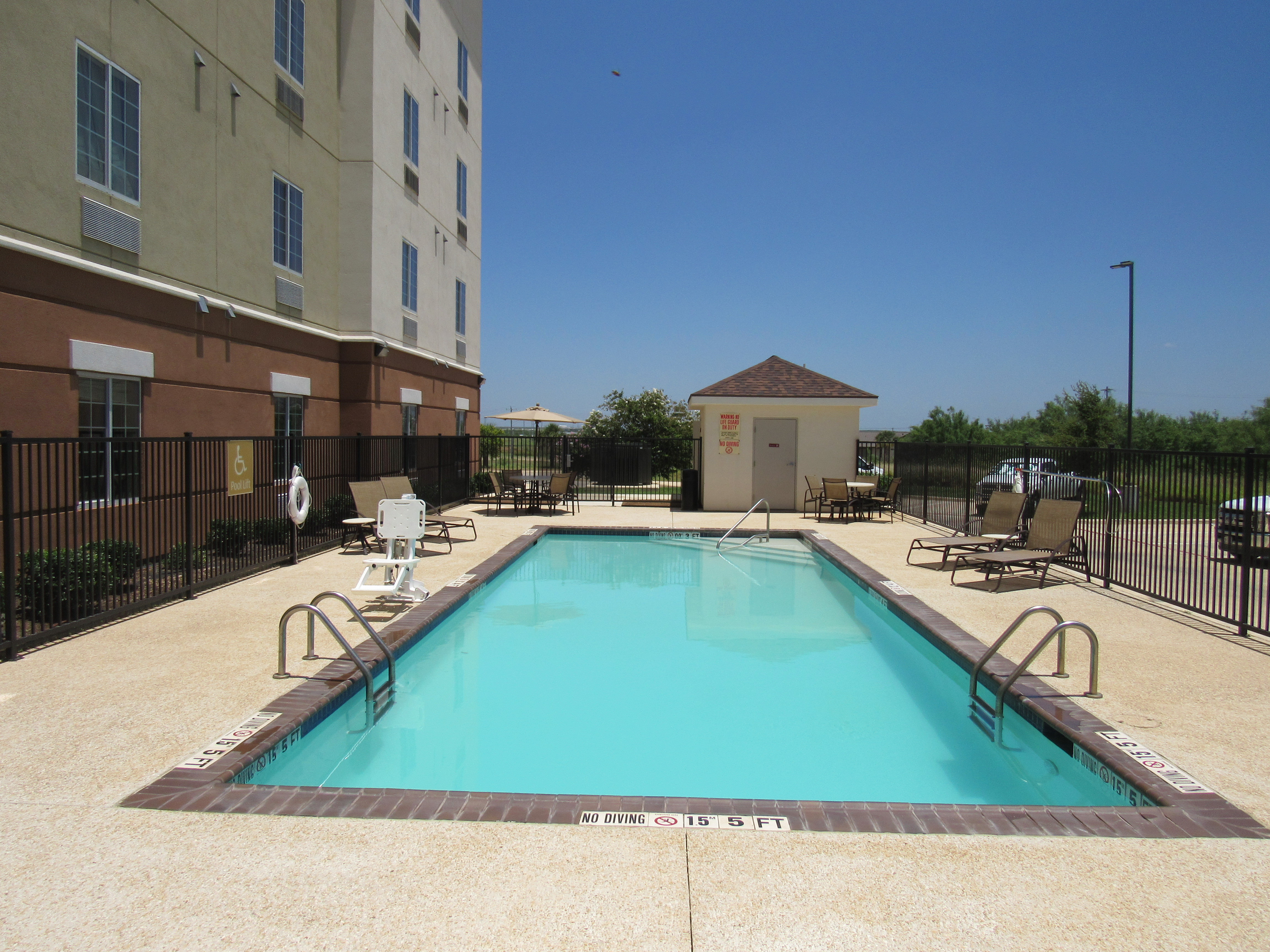 Enjoy the outdoor pool at the Candlewood Suites Cotulla, Texas