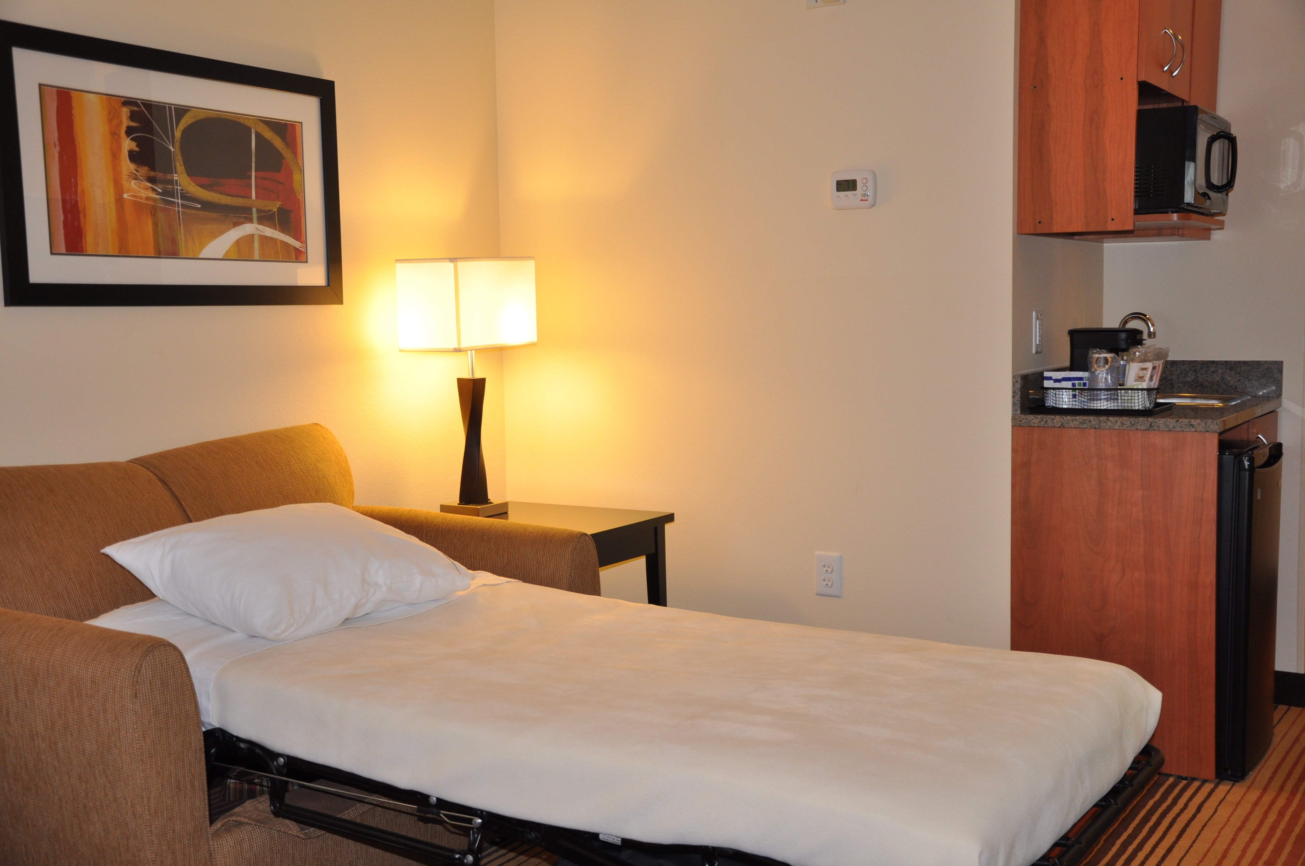 HOLIDAY INN EXP PRATTVILLE AL-guestroom-Sleeper Sofa.jpg