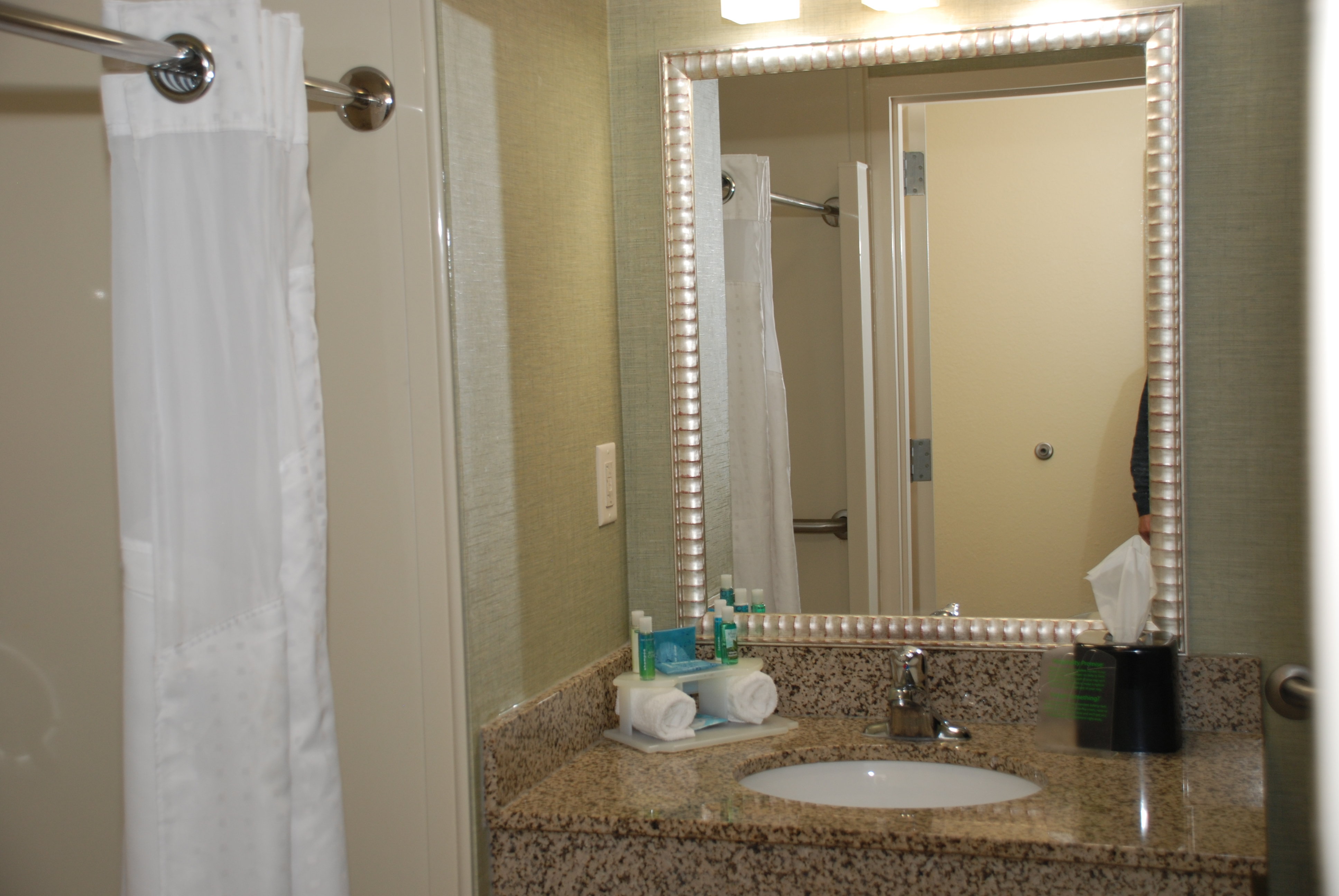 HOLIDAY INN EXP STES COVINGTON BY I-guestroom-Guest Bathroom.jpg