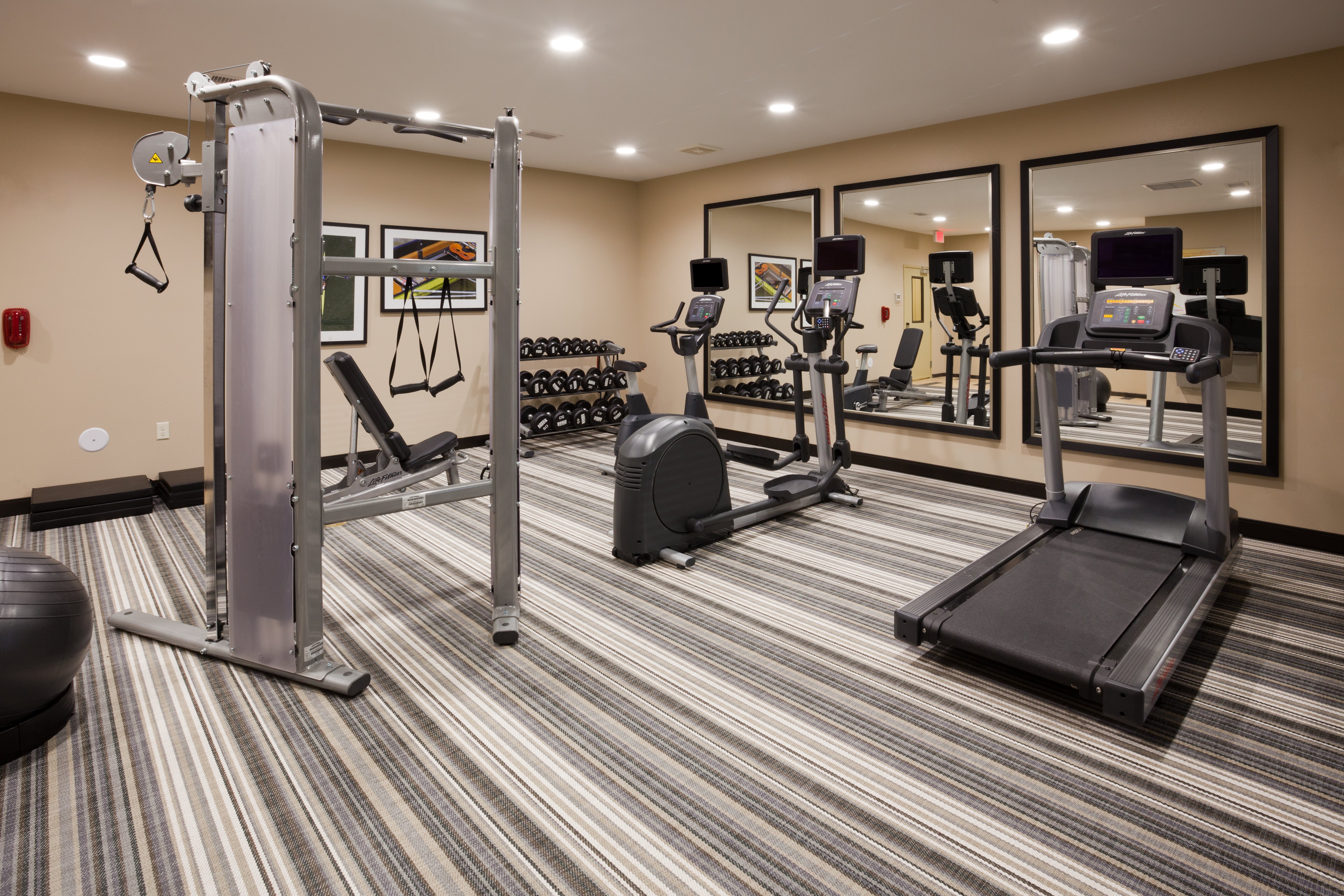 Stay fit, healthy, and happy in our Candlewood Fitness Center.