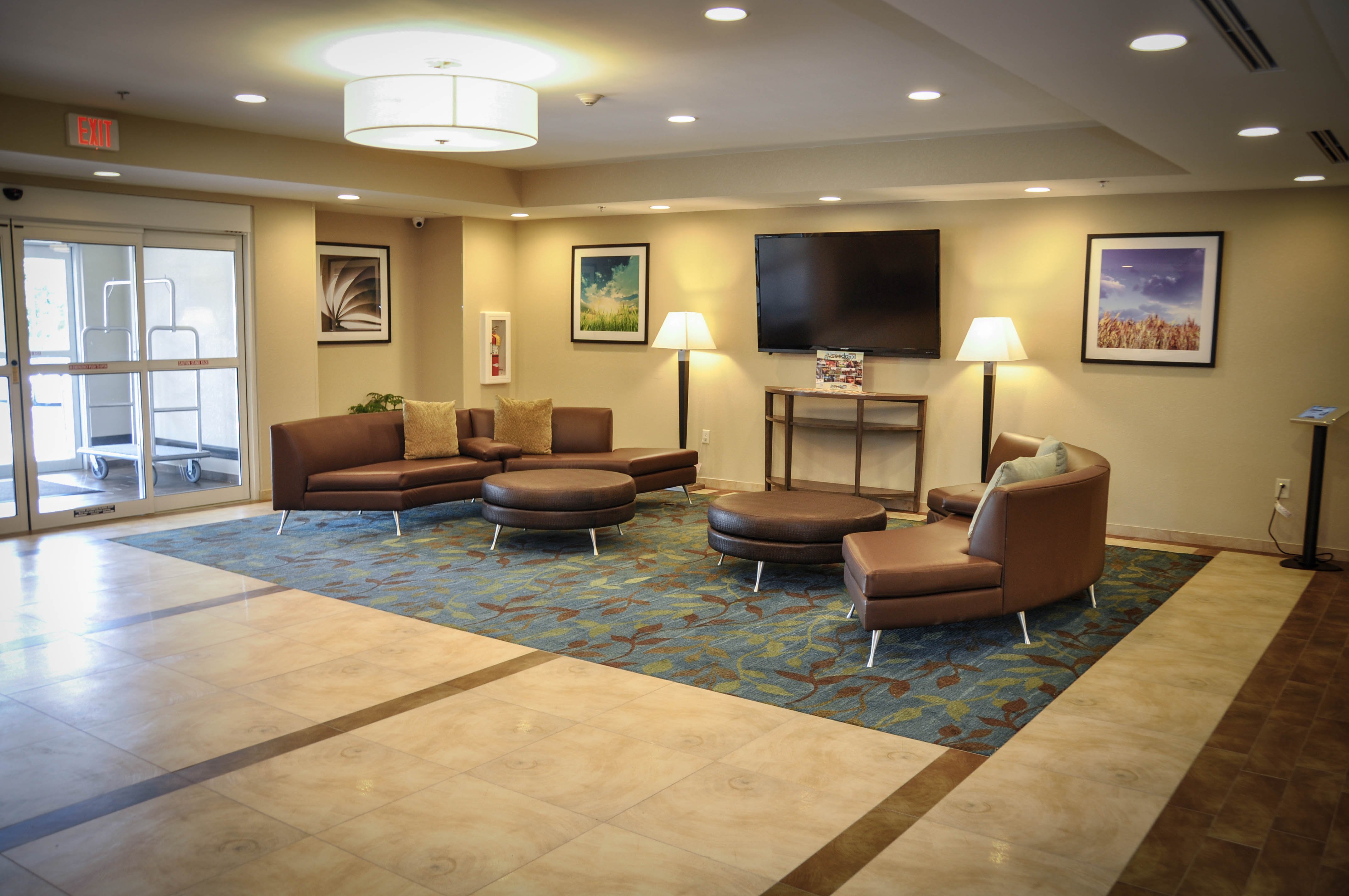 CANDLEWOOD STES NORTHEAST BY IHG-guestroom-Sit back and Relax in the Candlewood Suites Lobby!.jpg