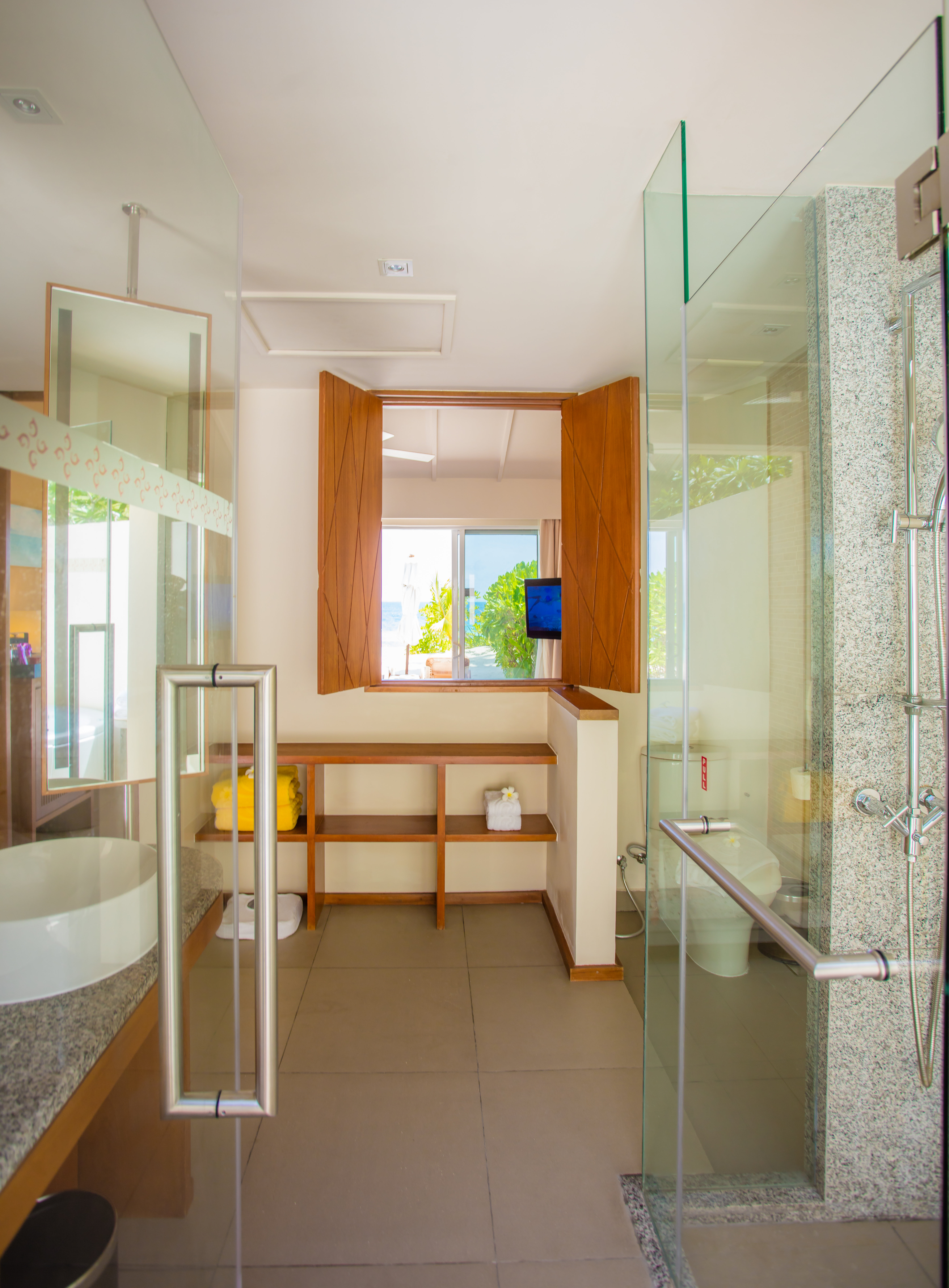 CENTARA RAS FUSHI MALDIVES-guestroom-02 Lagoon View Beach Villa with Swirl Pool - Bathroom 1.jpg