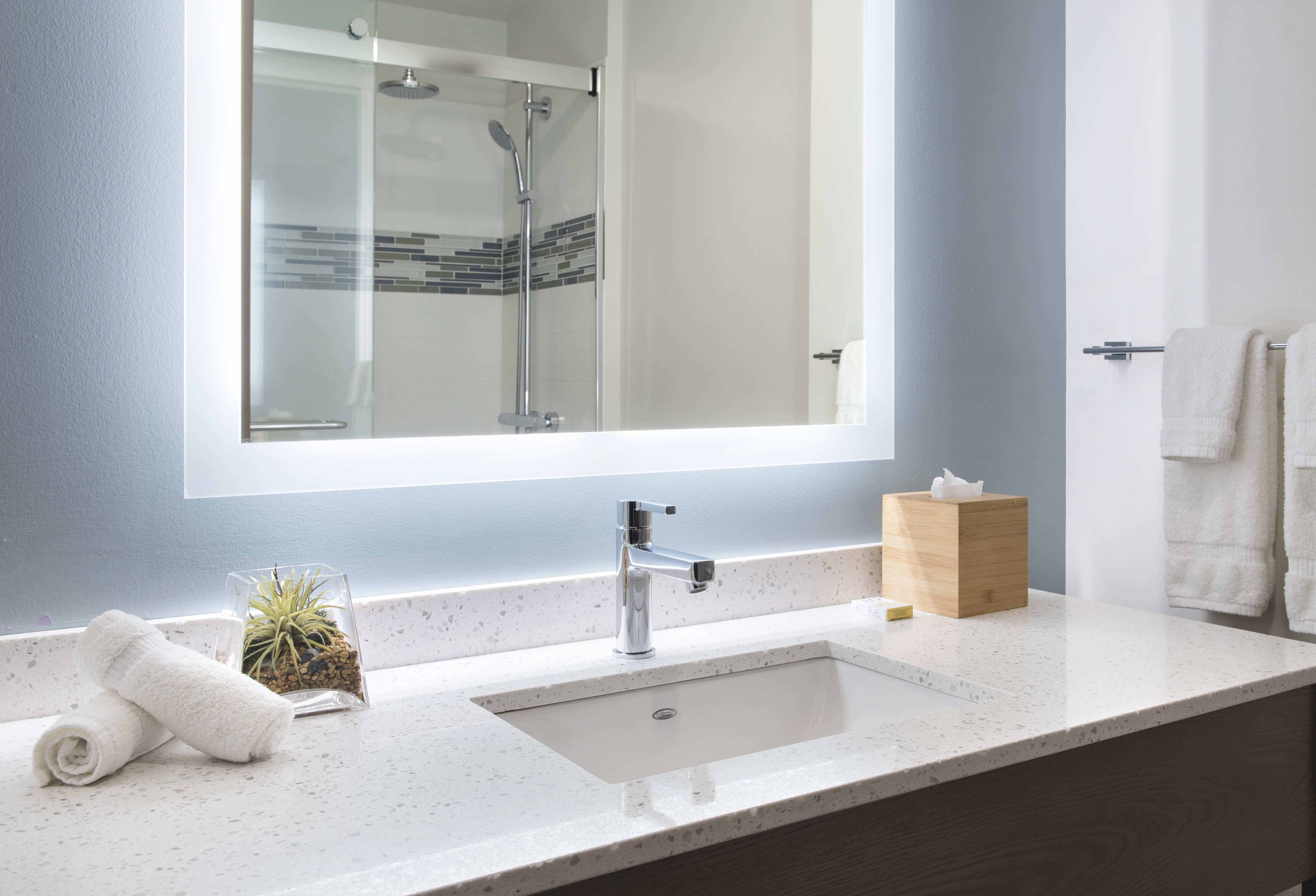 Guest baths feature spa-inspired showers & upscale amenities.