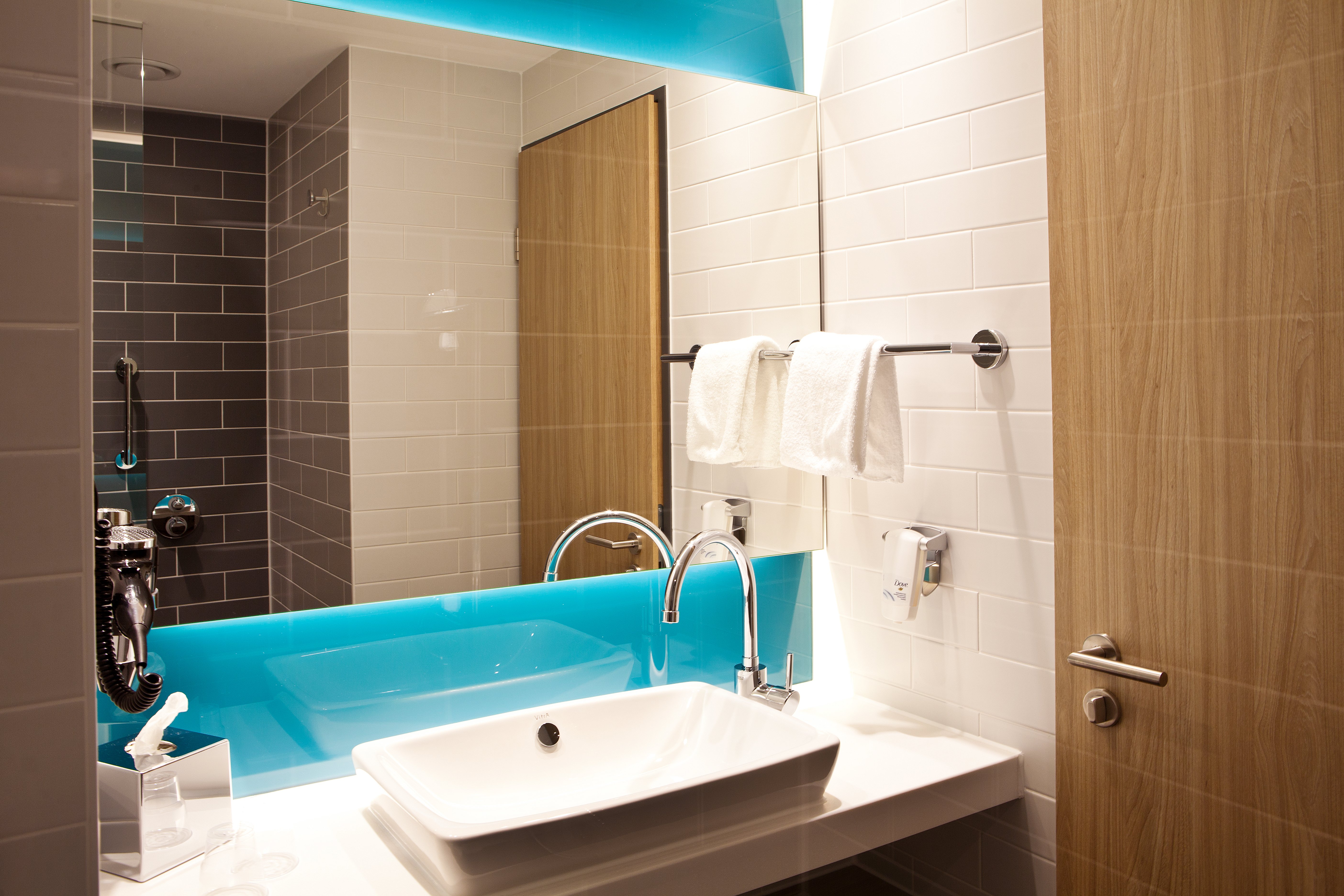 HOLIDAY INN EXP TRIER BY IHG-guestroom-Modern bathroom with floor heating.jpg