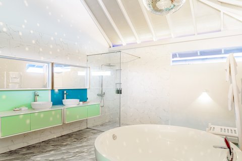 THE STANDARD MALDIVES - Photo 40