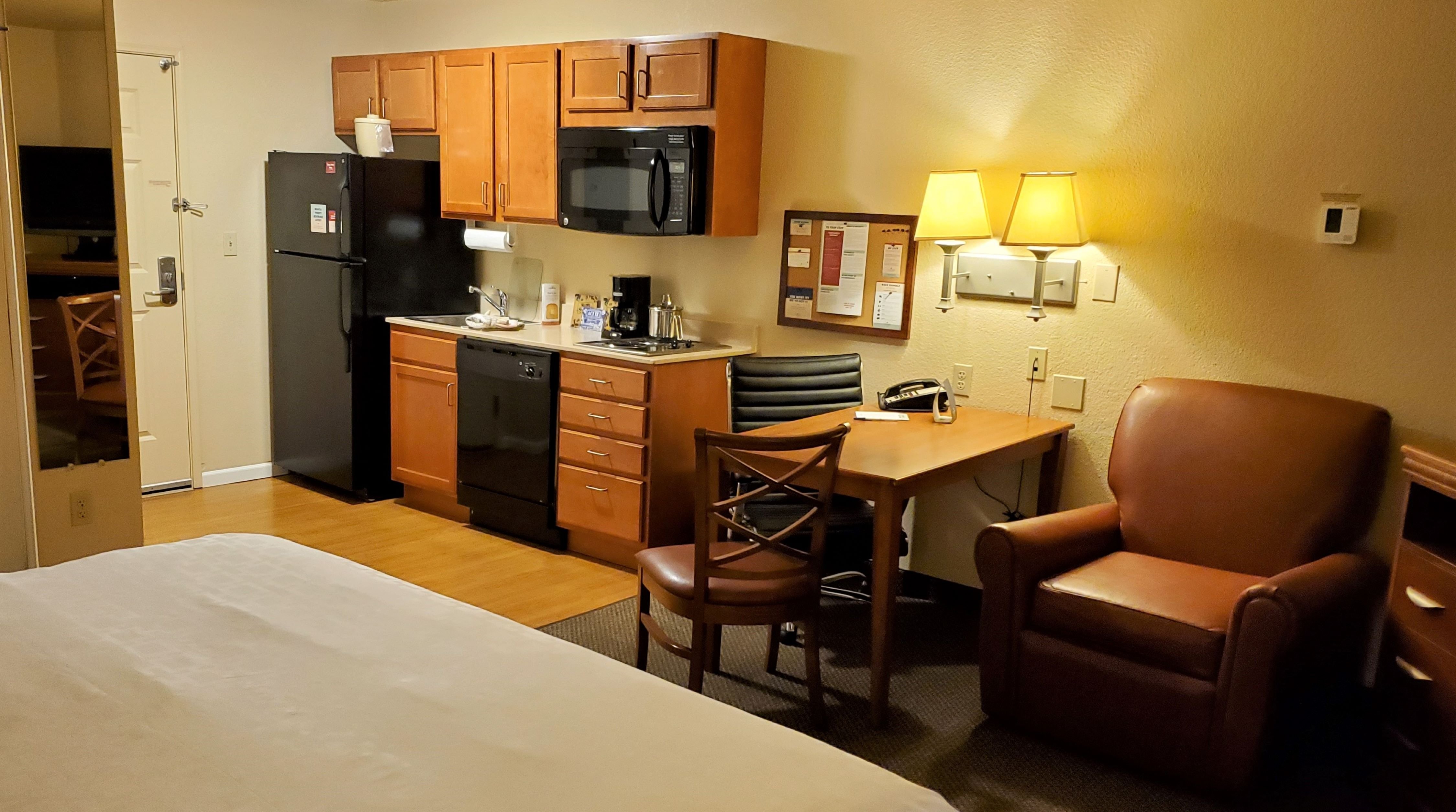CANDLEWOOD SUITES UNIV OF AR BY IHG-guestroom-The kitchen with dishwasher, microwave and refrigerator with ice.jpg