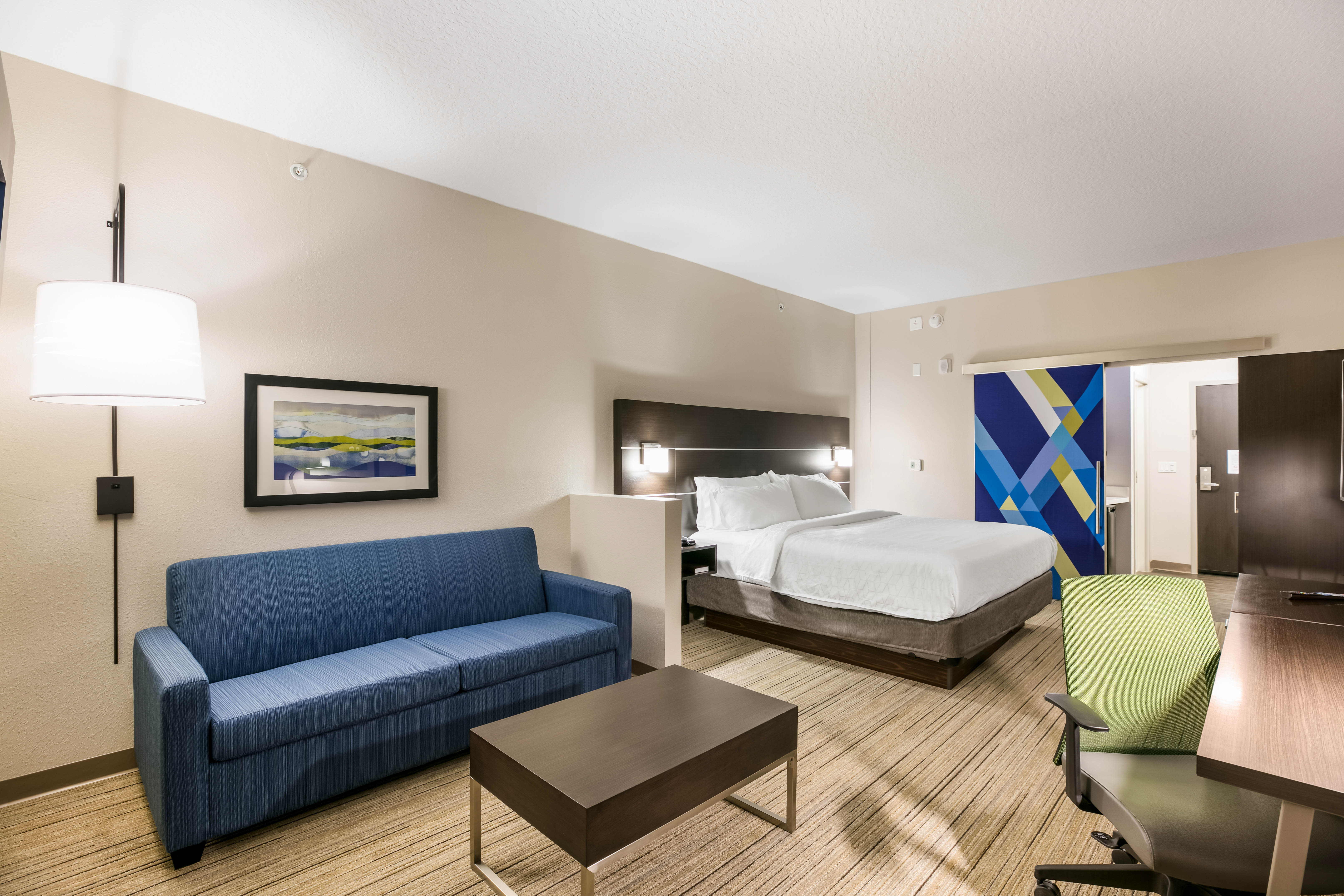 HOLIDAY INN EXP STES TOWN CENTER BY-guestroom-King Bed Suite with Sofa Bed. Barn Door's to reduce noise..jpg
