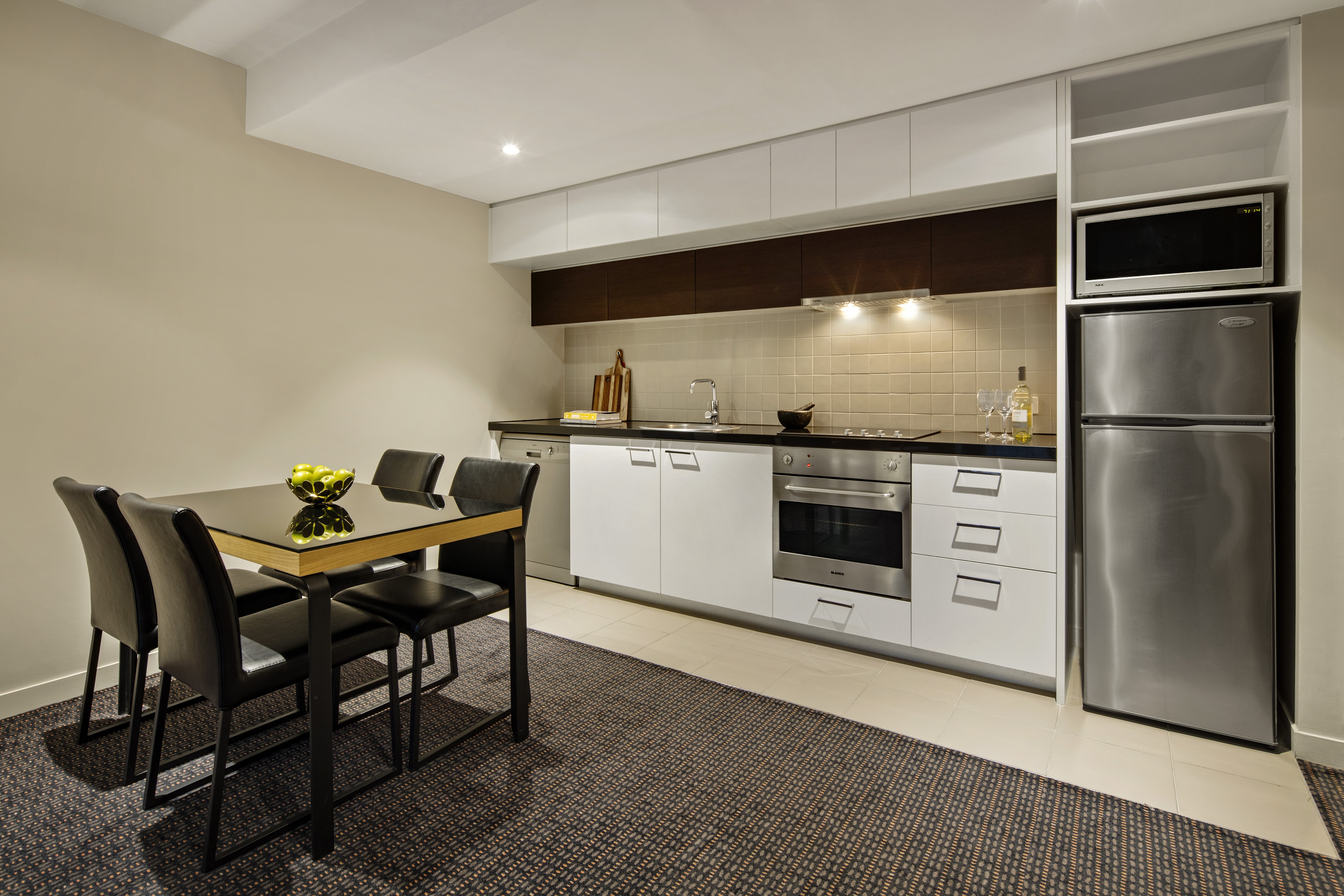 QUEST DOCKLANDS-guestroom-One Bedroom Apartment Dining Kitchen.jpg