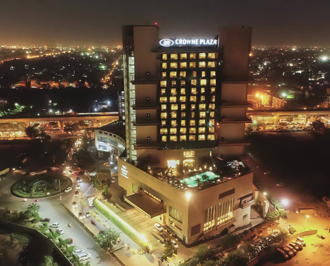 Aerial night view of the Hotel with a city landscape