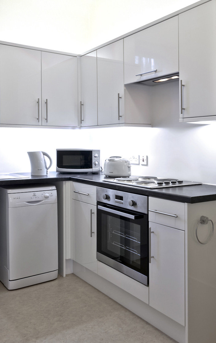 SKENE ROSEMOUNT-guestroom-Bed Kitchen.jpg