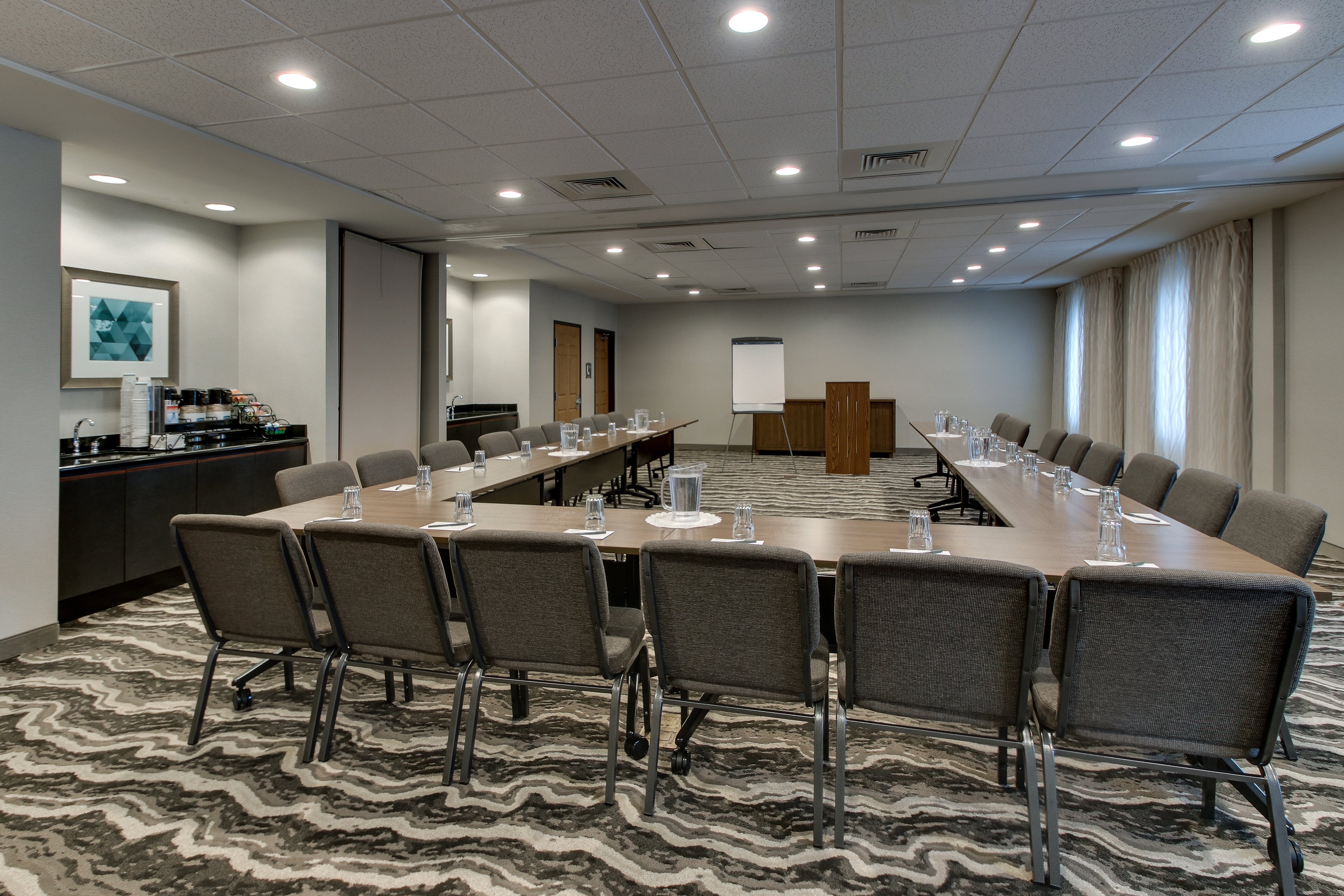 Full meeting room with a U Shape set up