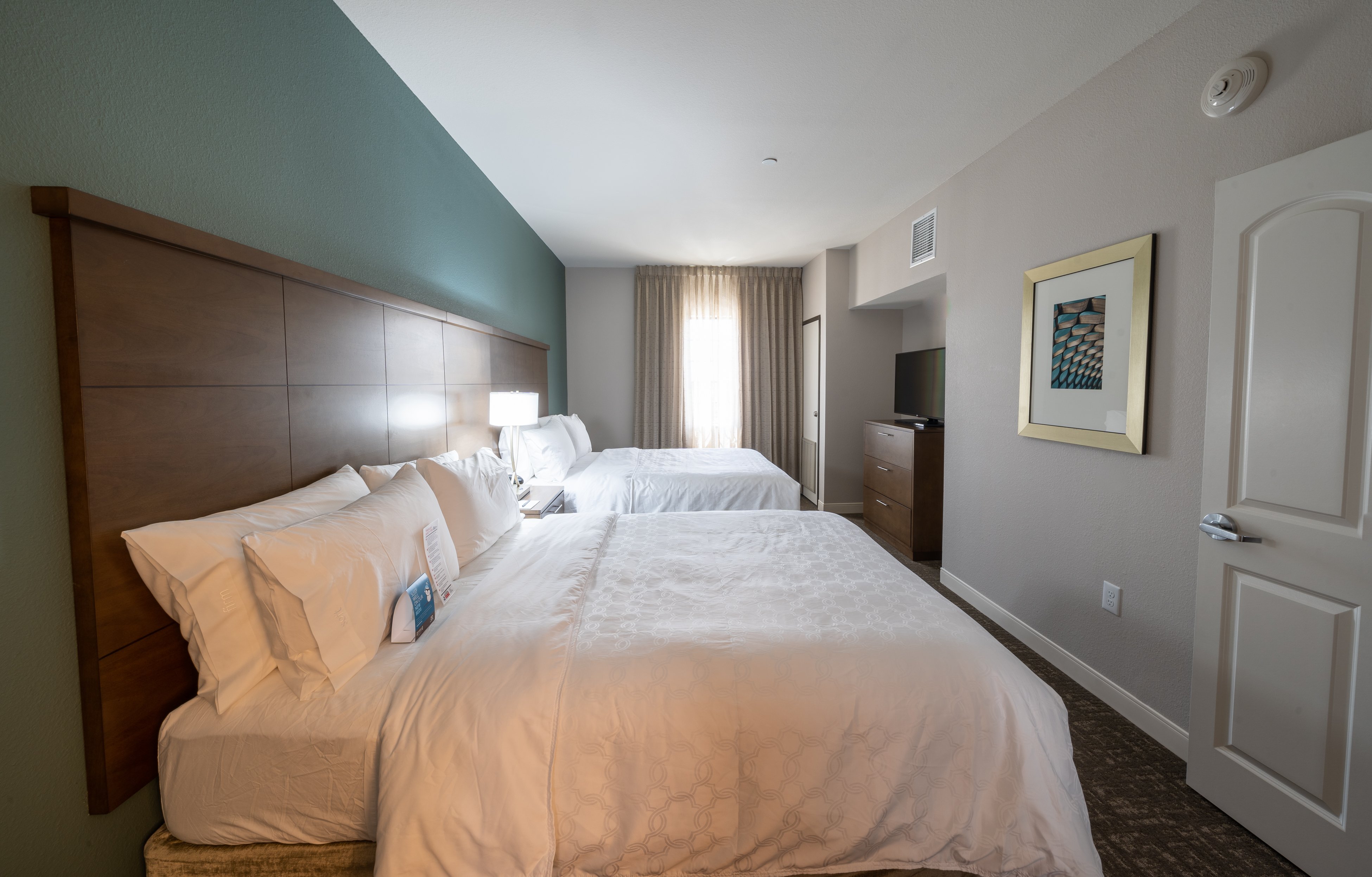 STAYBRIDGE STES BAYTOWN BY IHG-guestroom-Double Queen one bedroom suite.jpg