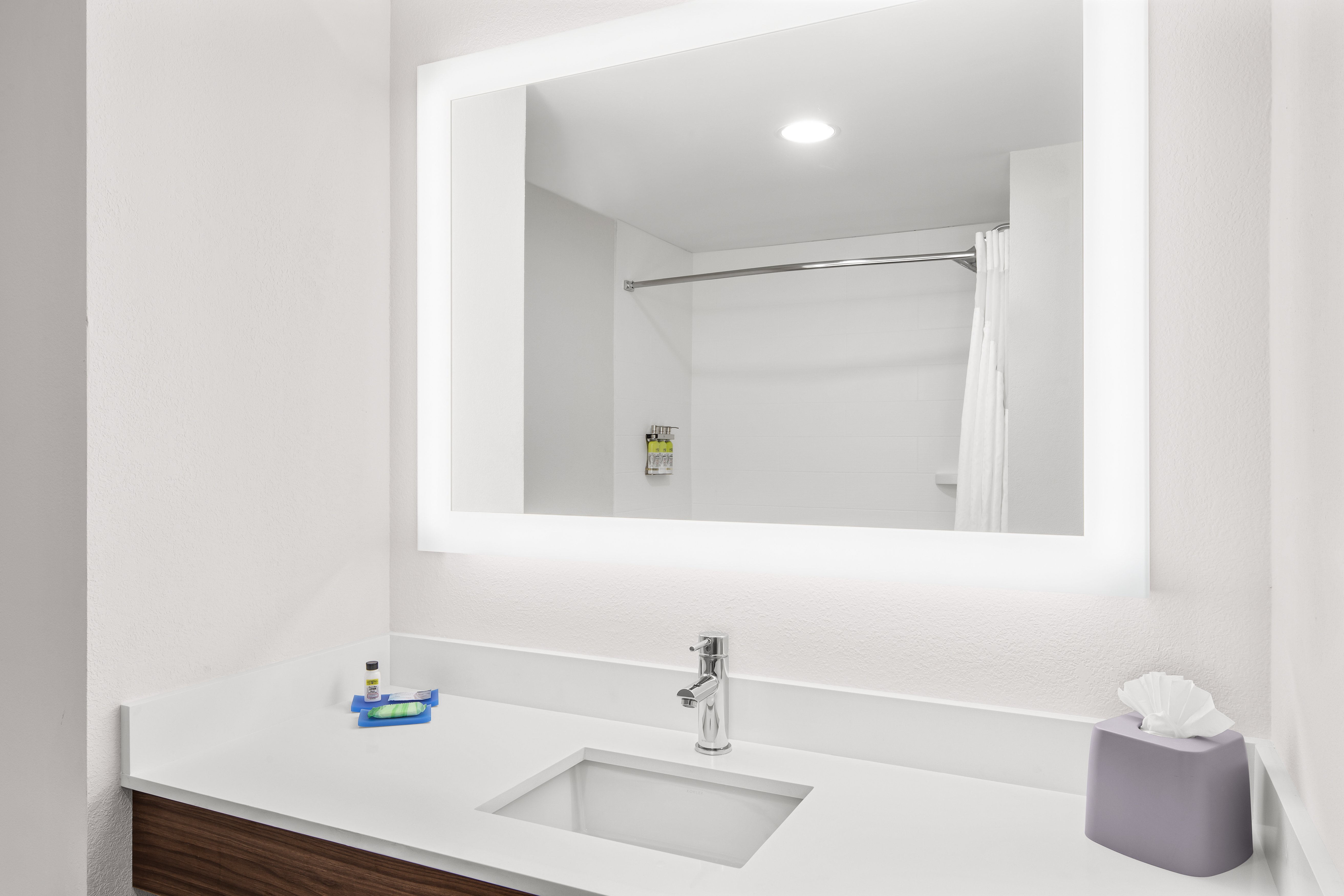 HOLIDAY INN EXP STES PALM BAY BY IH-guestroom-Our guest bathrooms have plenty of counter space to get ready..jpg