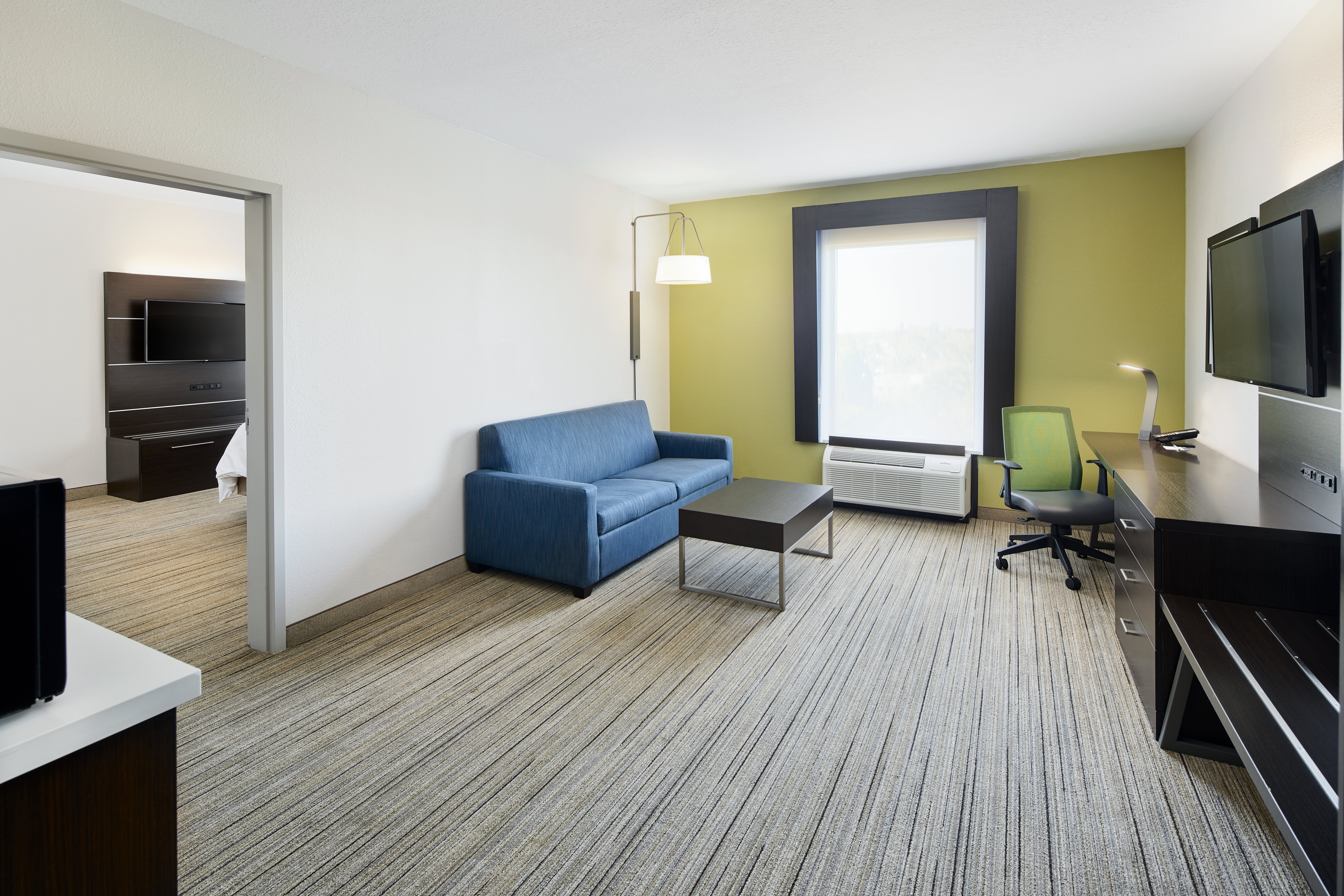HOLIDAY INN EXP PORT RICHEY-guestroom-2 Room Executive Suite King .jpg