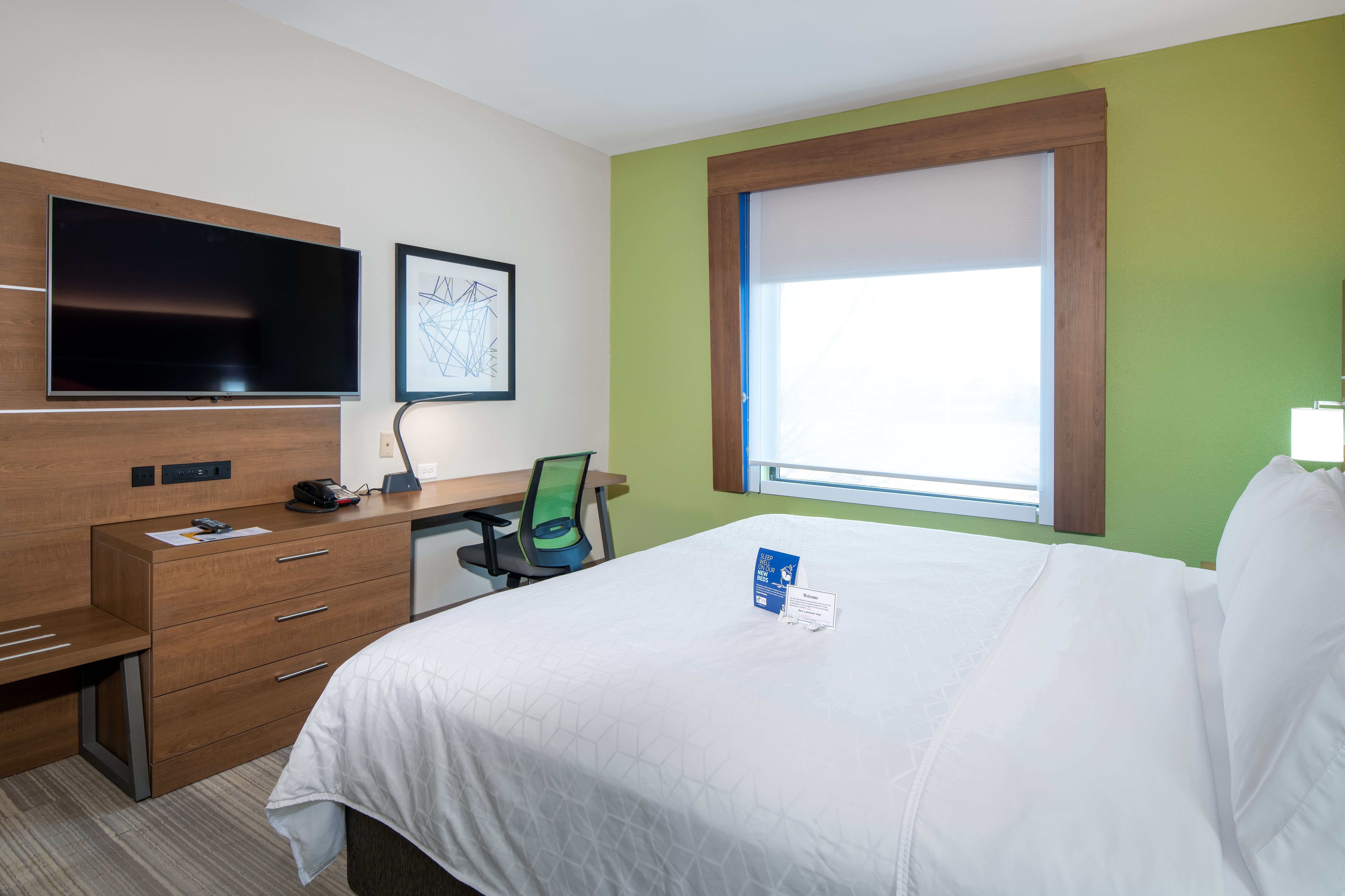 HOLIDAY INN EXP STES - DESOTO BY IH-guestroom-Unwind in your room while you watch your favorite TV show..jpg