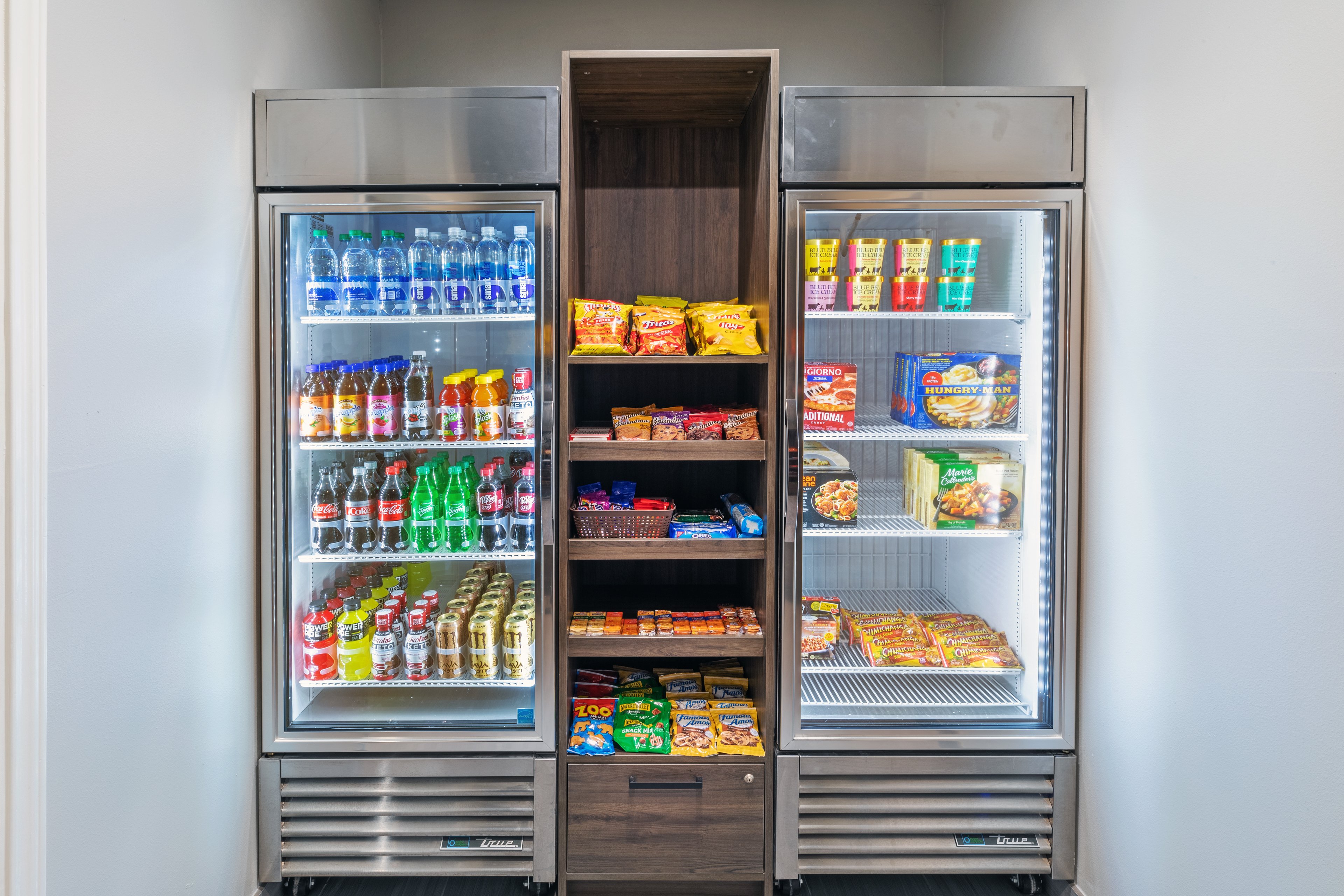 STAYBRIDGE STES HUMBLE BY IHG-guestroom-Snacks & drinks for purchase 24/7 at the Staybridge Suites Pantry.jpg