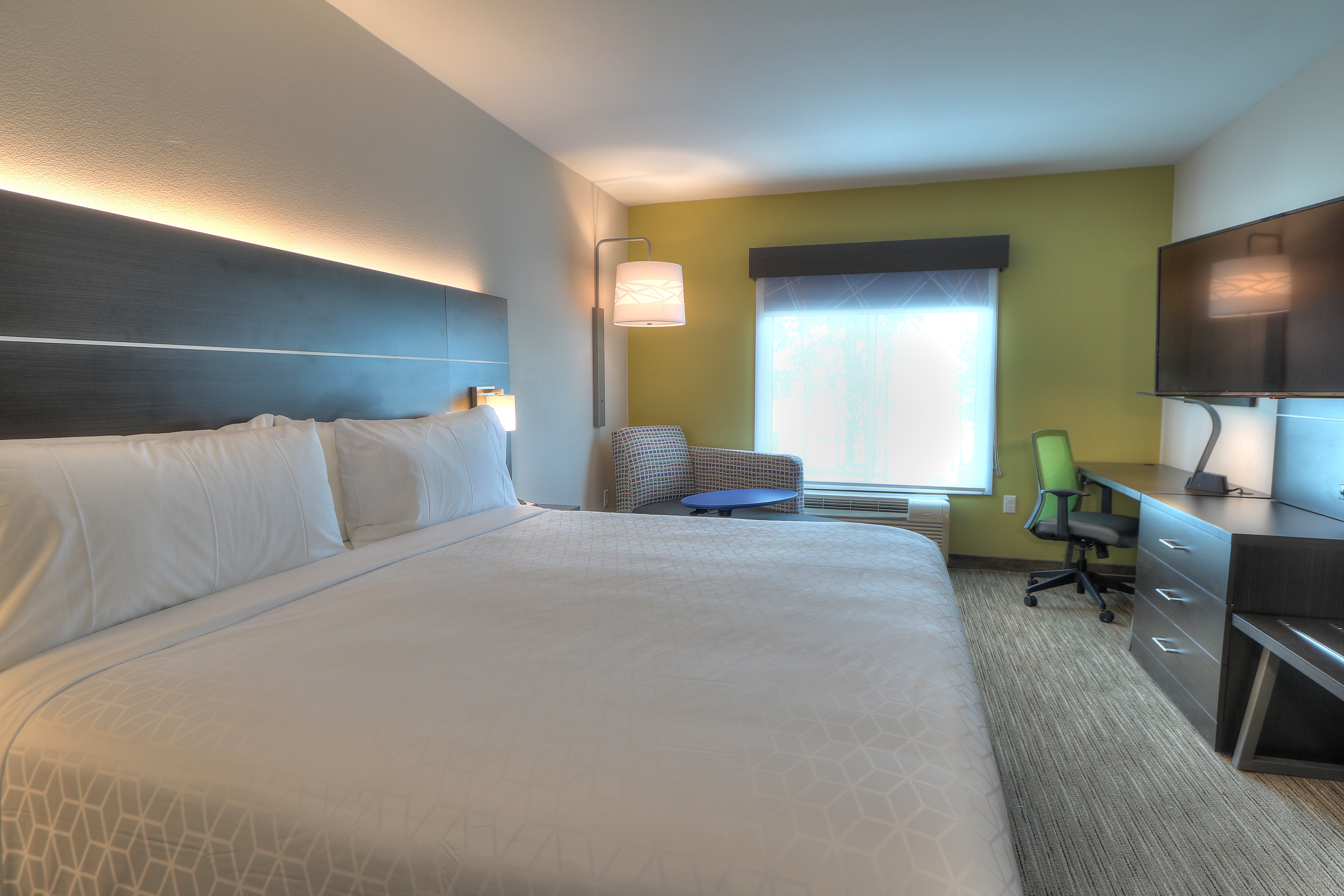 Relax in our spacious modern guest rooms while on the road. 