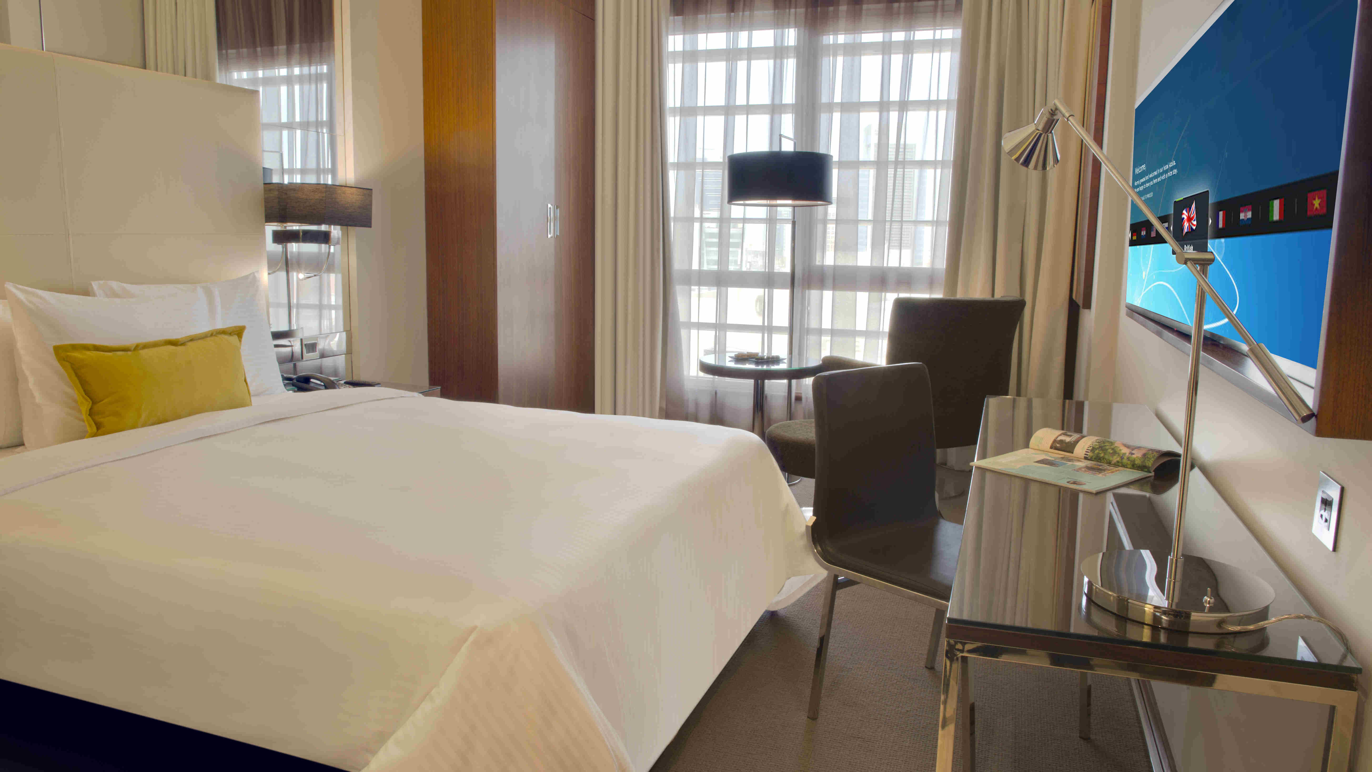 Centro Corniche-guestroom-One Bedroom Suite - Queen bed.jpg