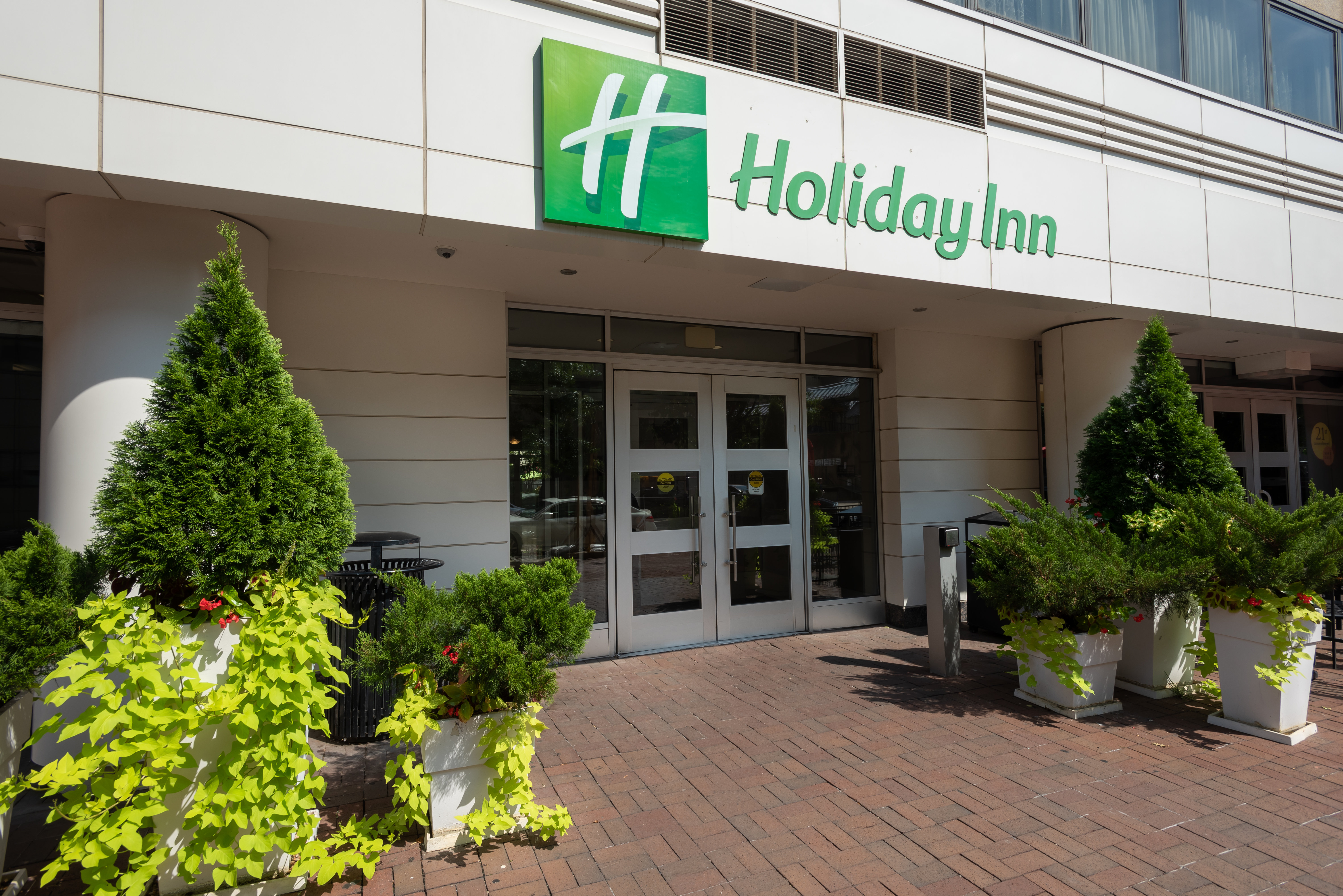 Enter from 6th Street, just across from L'Enfant Metro Station.