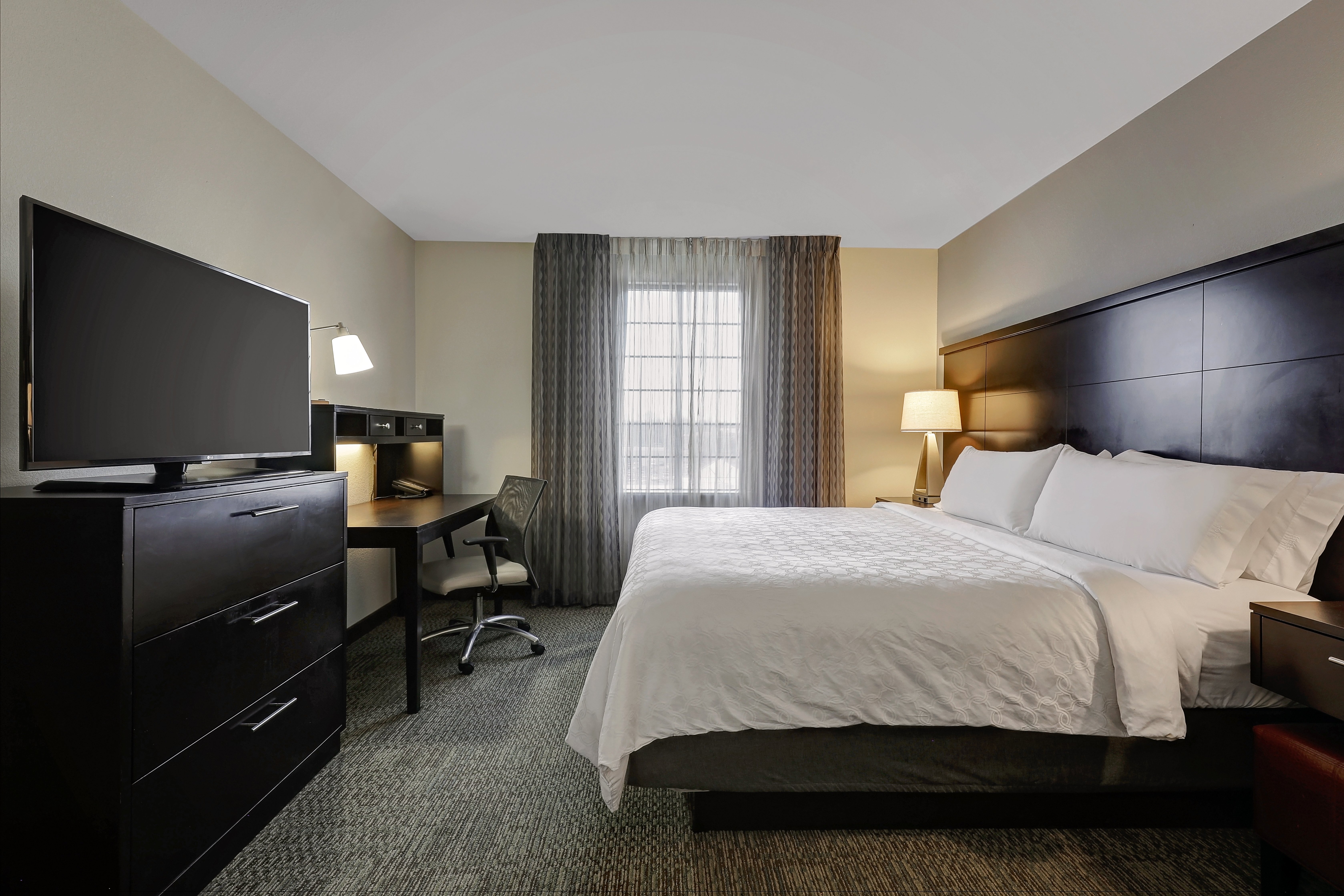 STAYBRIDGE STES GREENBELT BY IHG-guestroom-Plush bedding will help you get a goodnight's rest!.jpg