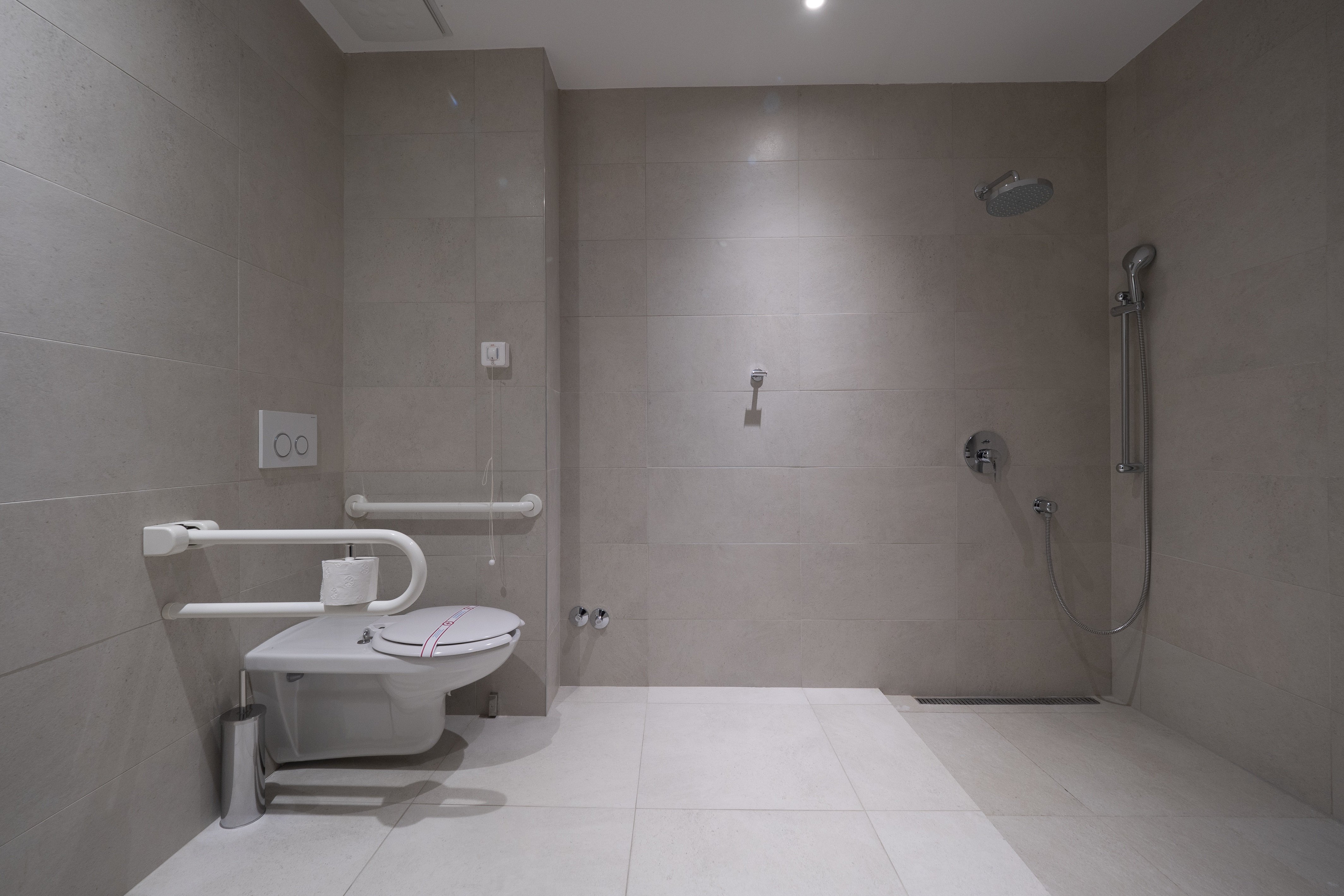VOCO PODGORICA BY IHG-guestroom-Suite Accessible Roll in Shwr1.jpg