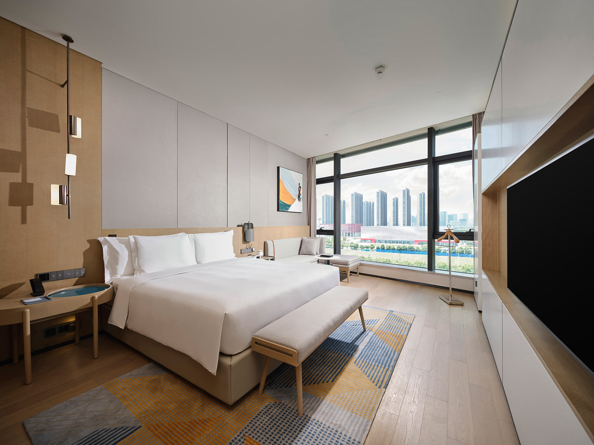 EVEN HOTEL YANGTZE RIVER BY IHG-guestroom-1 King 1 Bedroom Suite Football Stadium View.jpg