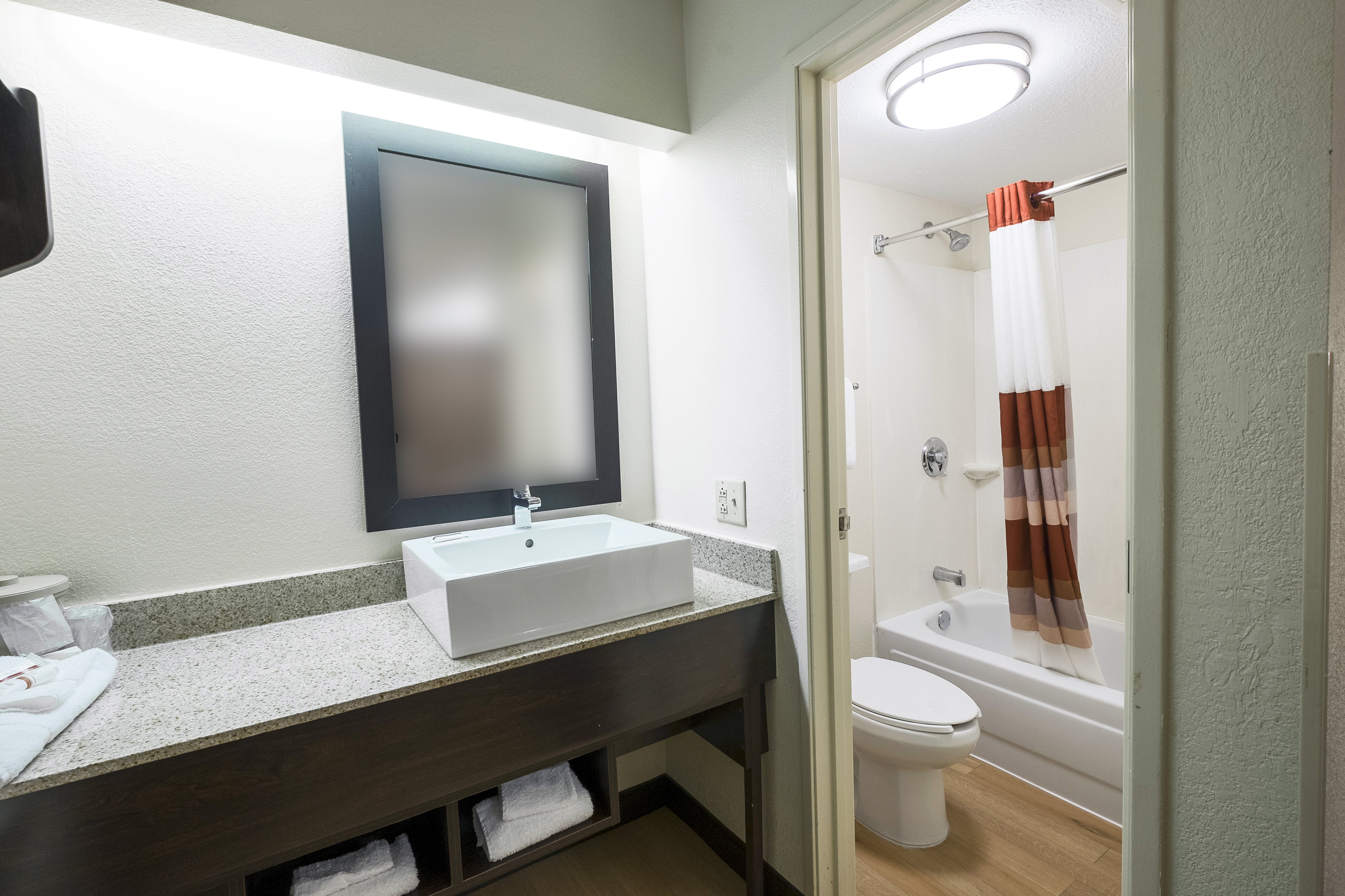 RED ROOF PLUS WEST SPRINGFIELD-guestroom-Bathroom.jpg