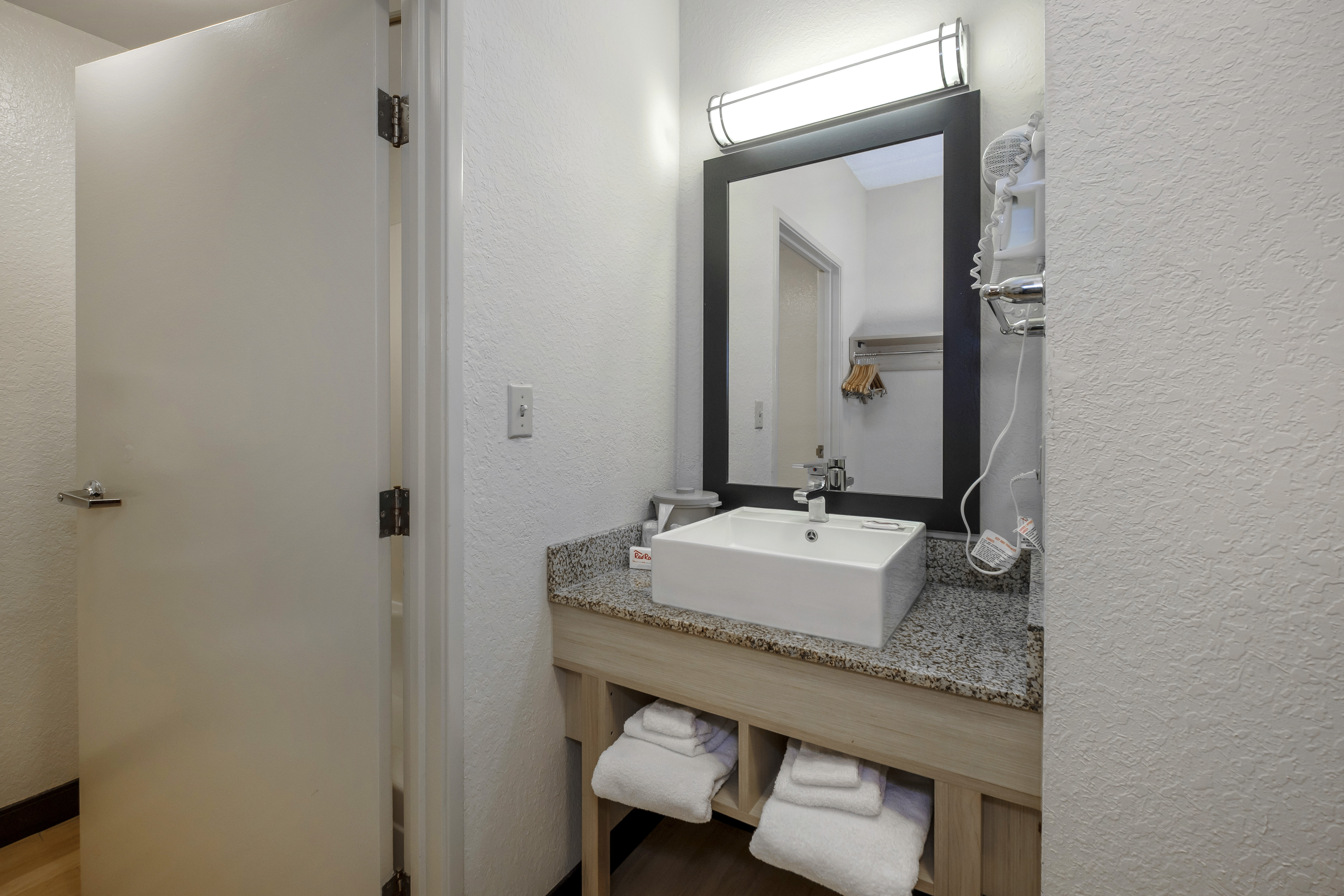RED ROOF PLUS GAINESVILLE-guestroom-Bathroom.jpg