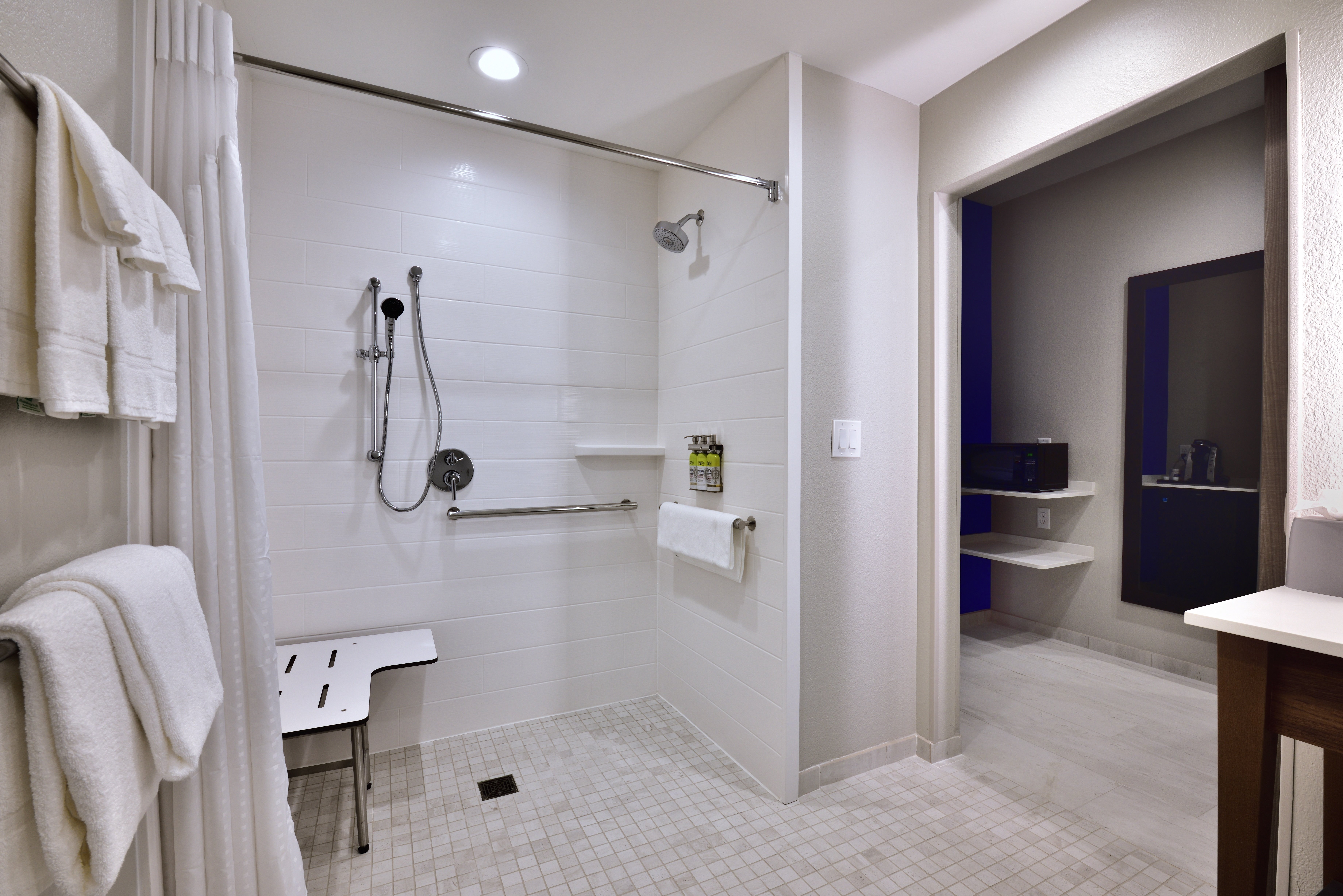 HOLIDAY INN EXP STES NORTH W-guestroom-ADA/Handicap accessible Guest Bathroom with mobility shower..jpg