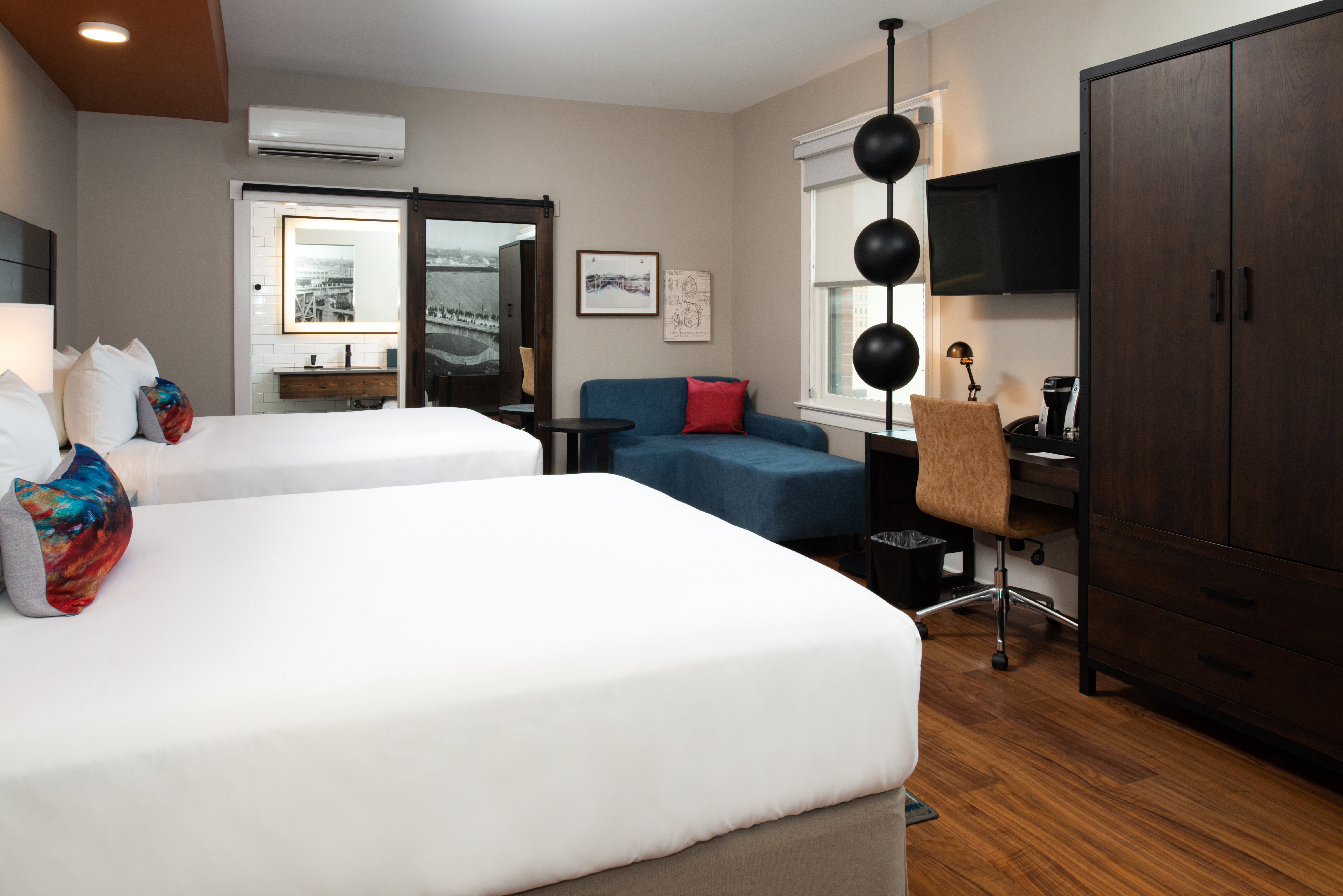 Hotel Indigo Spokane. Deluxe room with two queen beds. 