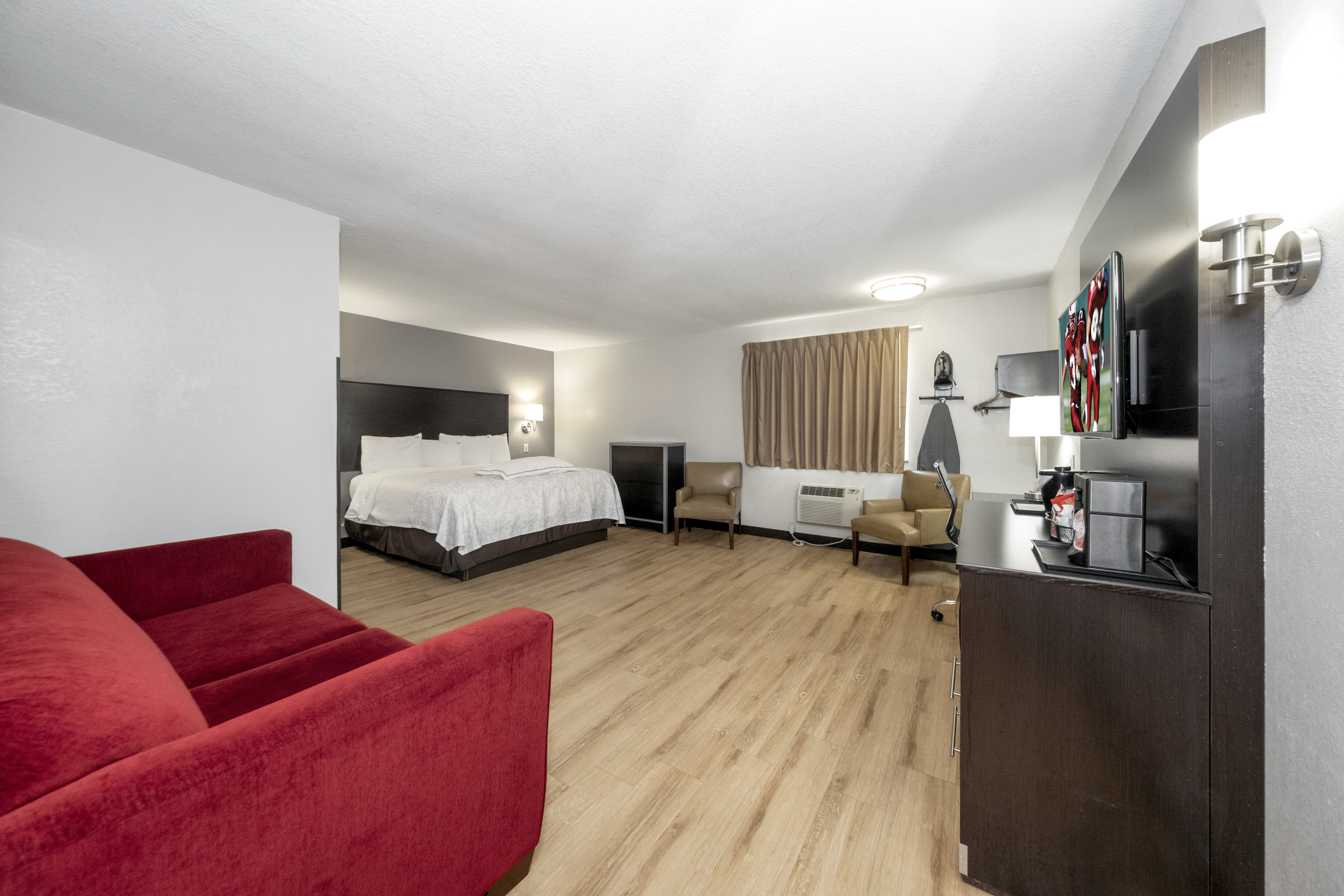 RED ROOF PLUS HUNSTVILLE-guestroom-403-premium-king-suite-1.jpg