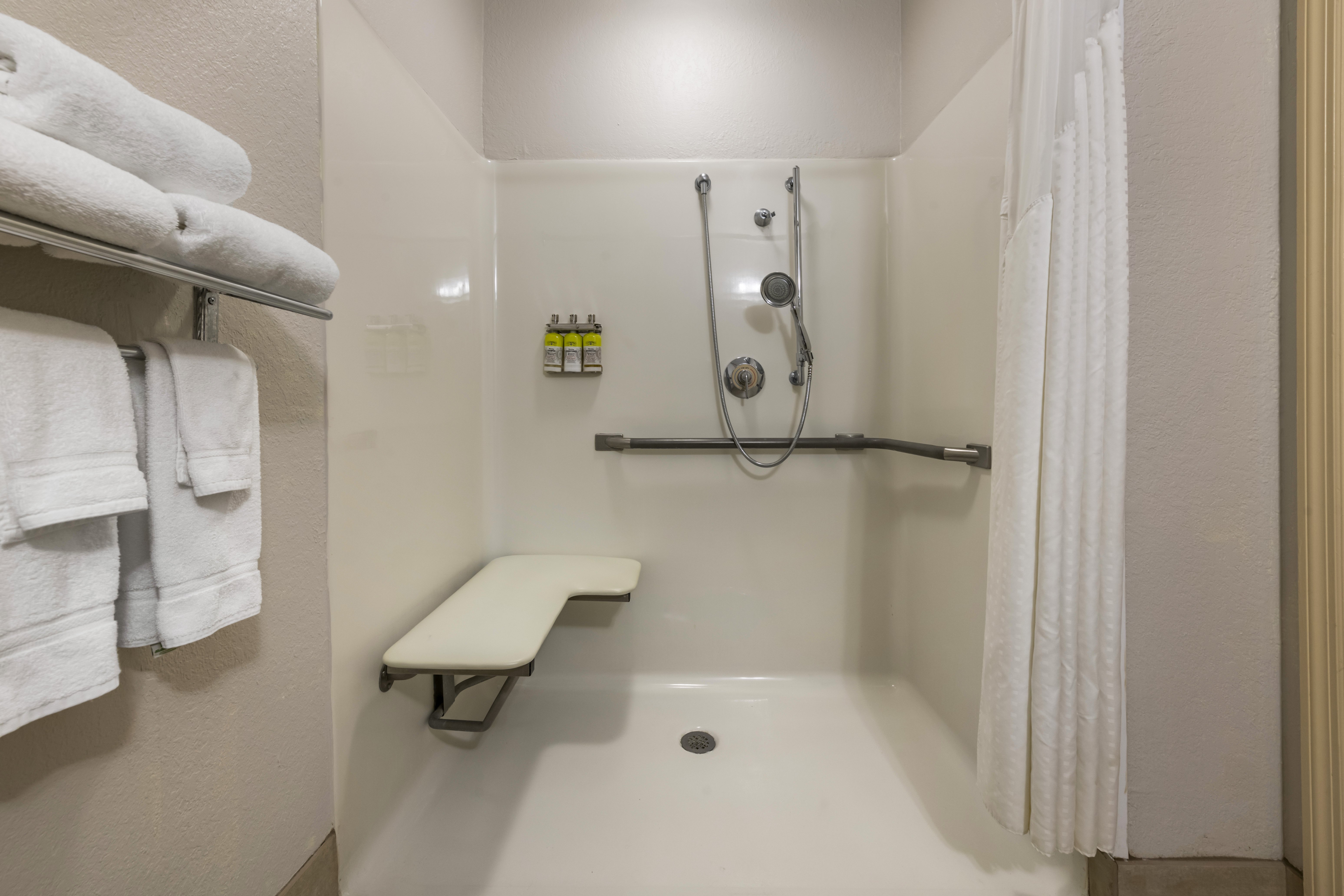 HOLIDAY INN EXP THE VILLAGES BY IHG-guestroom-Roll-in Shower.jpg