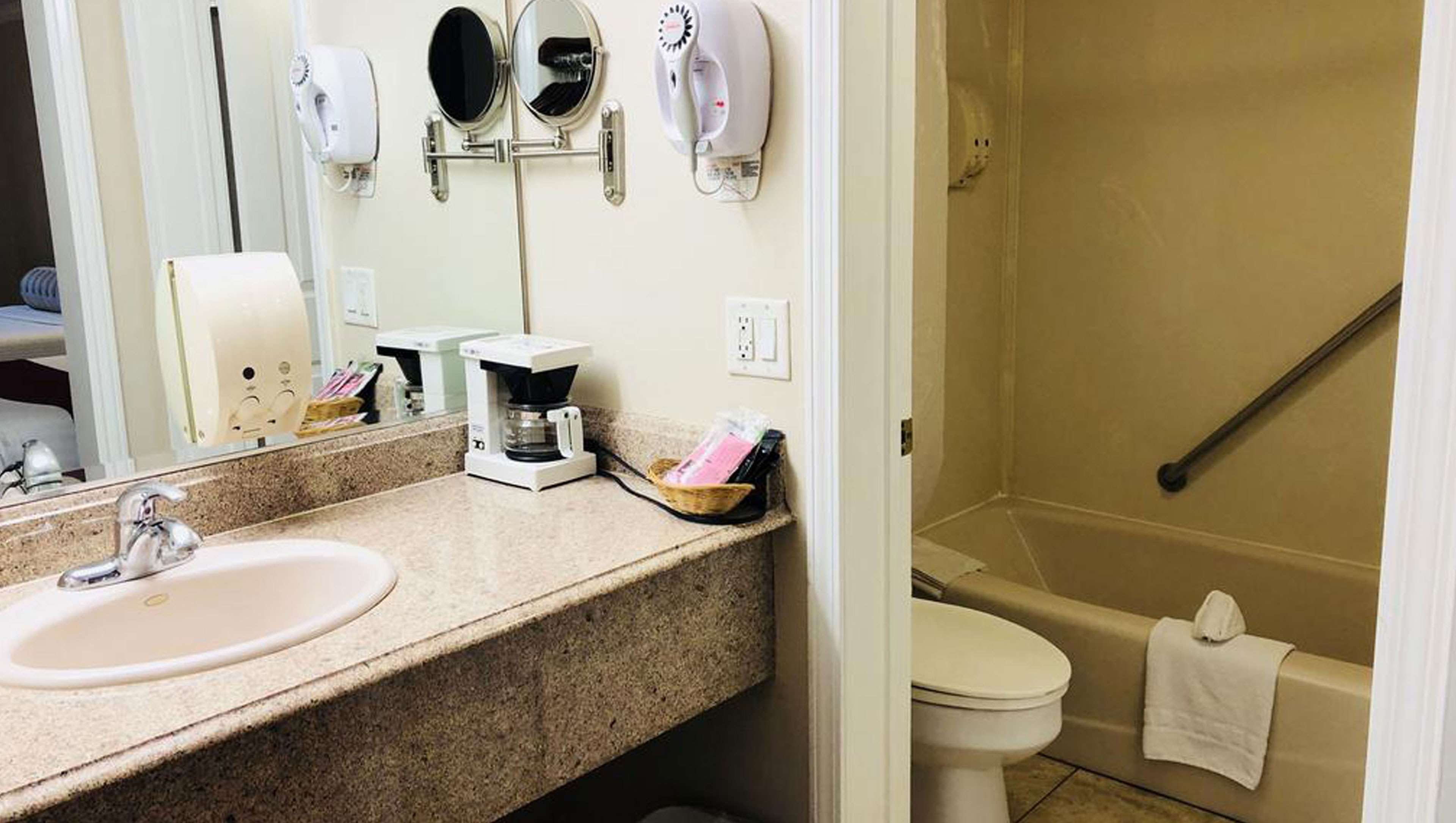 DYNASTY SUITES HOTEL RIVERSIDE-guestroom-MH DynastySuitesHotel Riverside CA Guestroom Bathroom.jpg