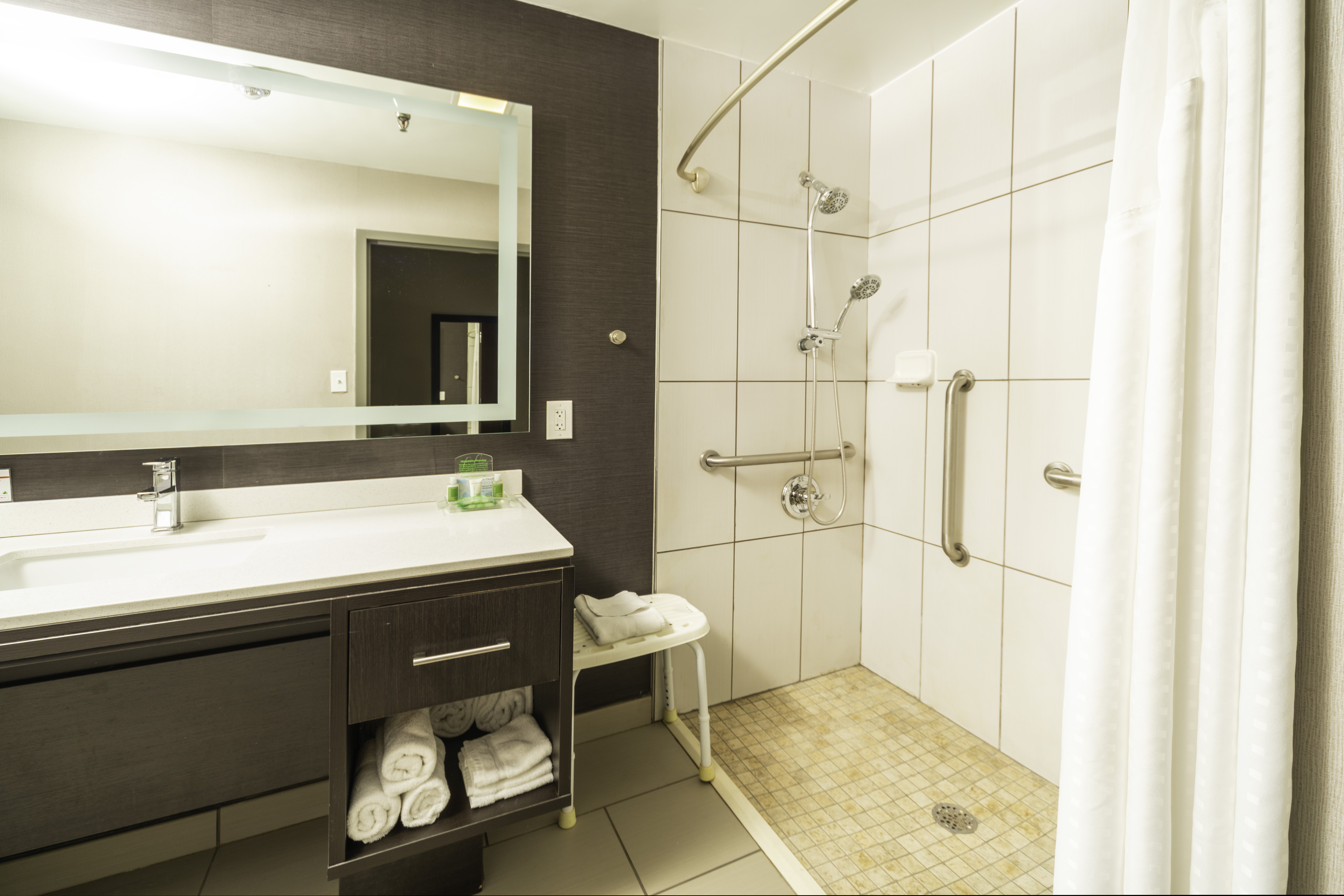 We have designed our accessible bathroom for your convenience.