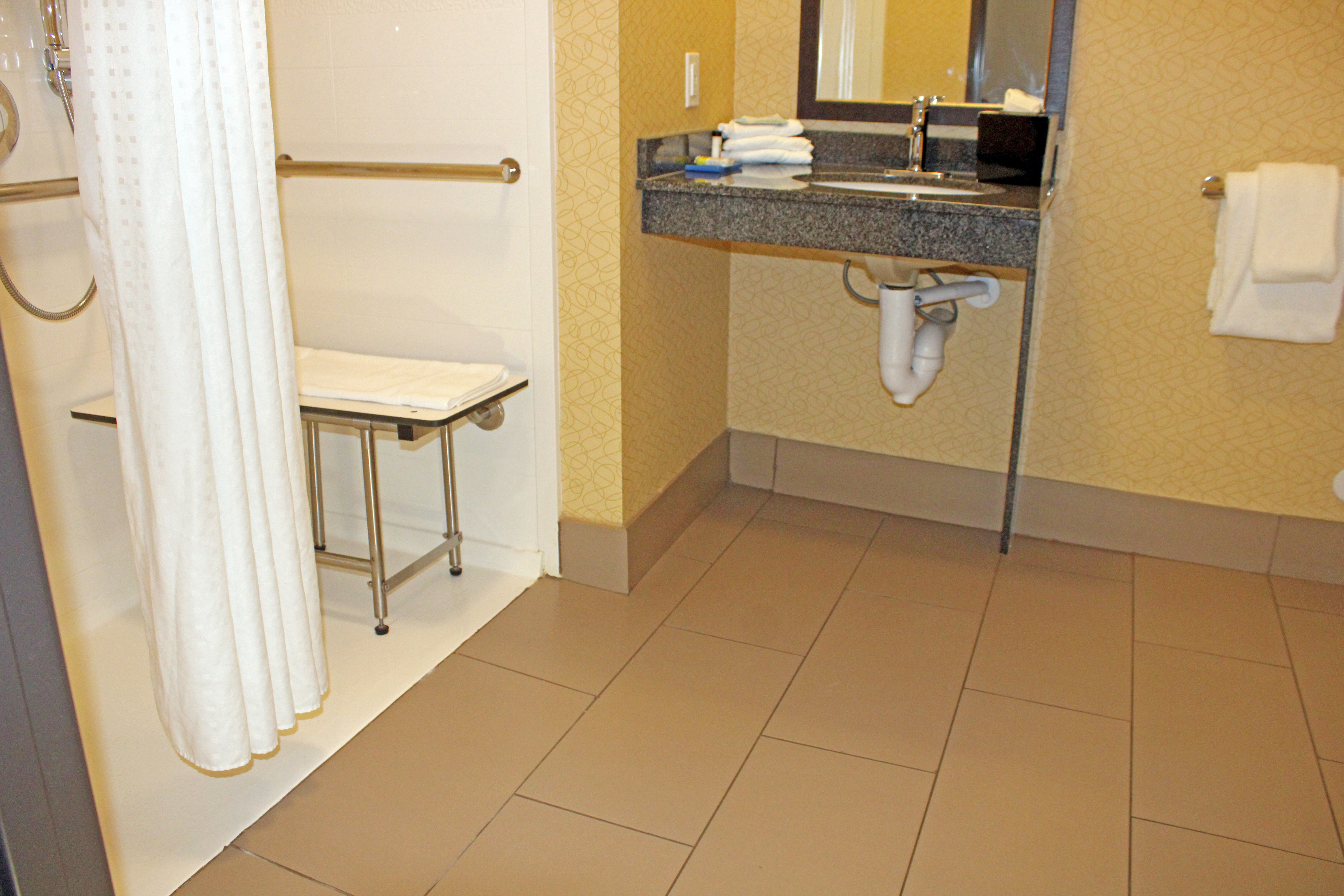 ADA compliant sink with covered plumbimg 