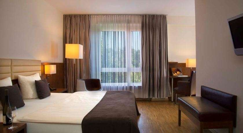 SIMONS PLAZA GREVENMACHER-guestroom-Guest Room.jpg