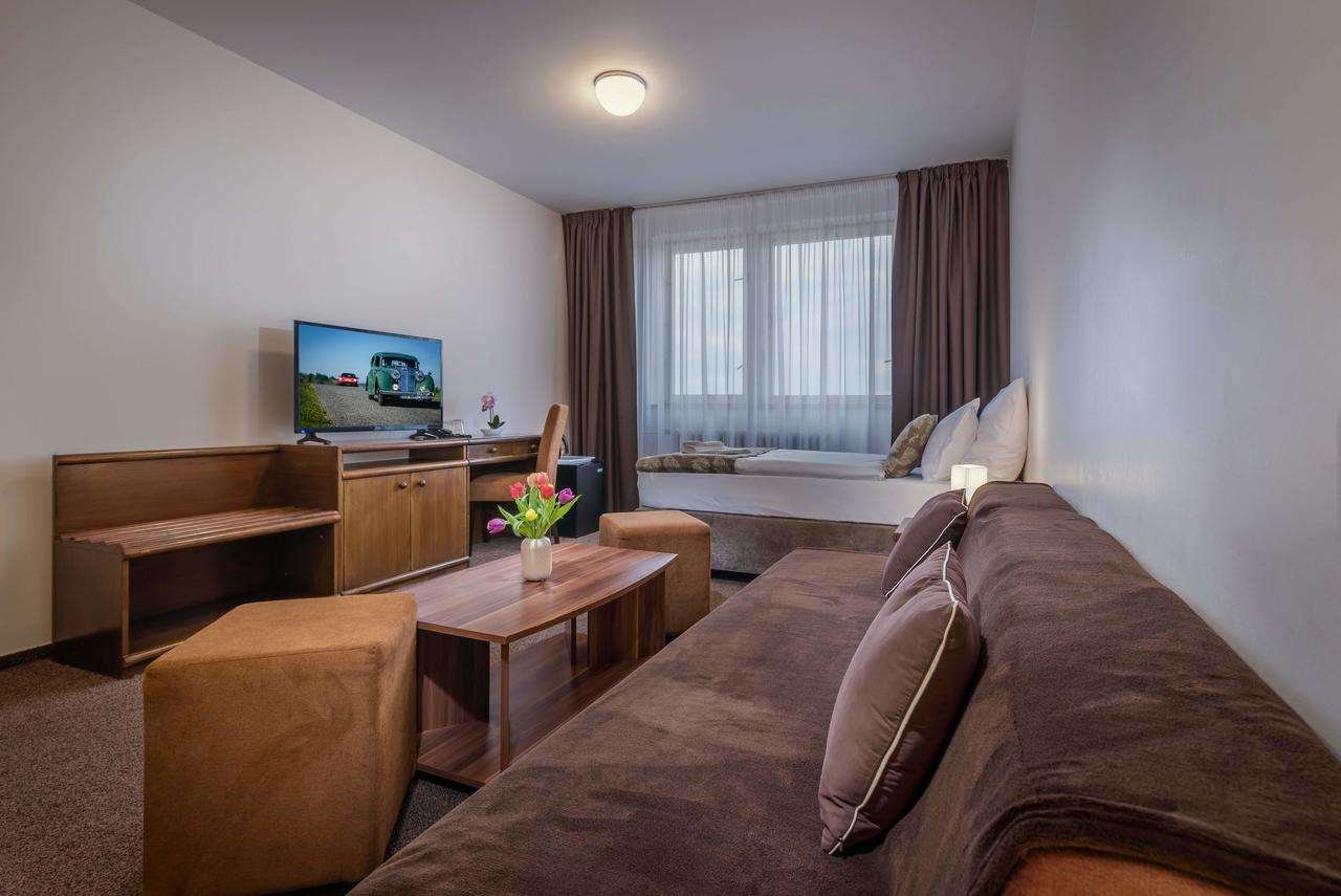 SATEL HOTEL POPRAD-guestroom-GUEST ROOM LIVING AREA.jpg