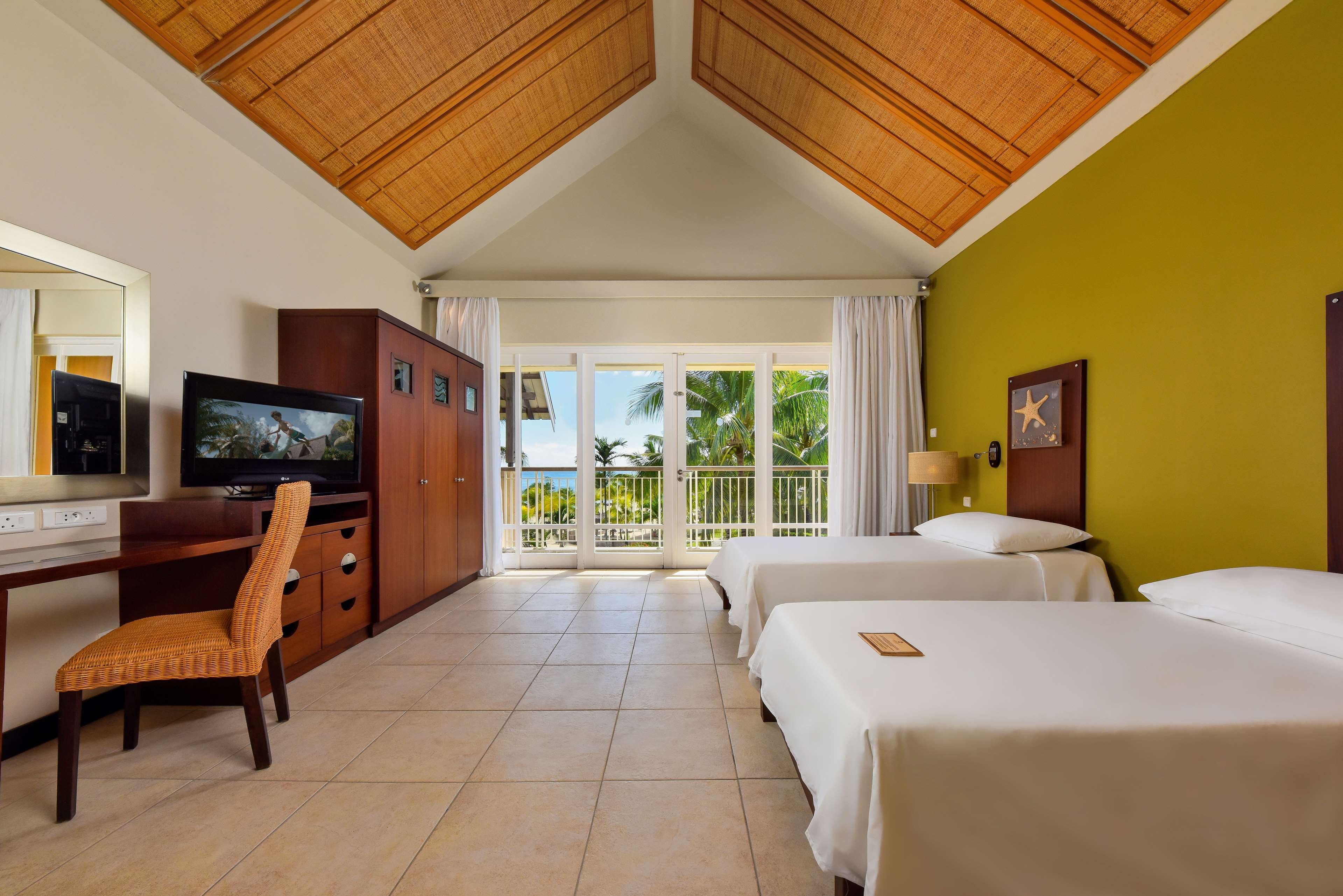 VICTORIA BEACHCOMBER RESORT AND SPA-guestroom-Family Apt children room.jpg