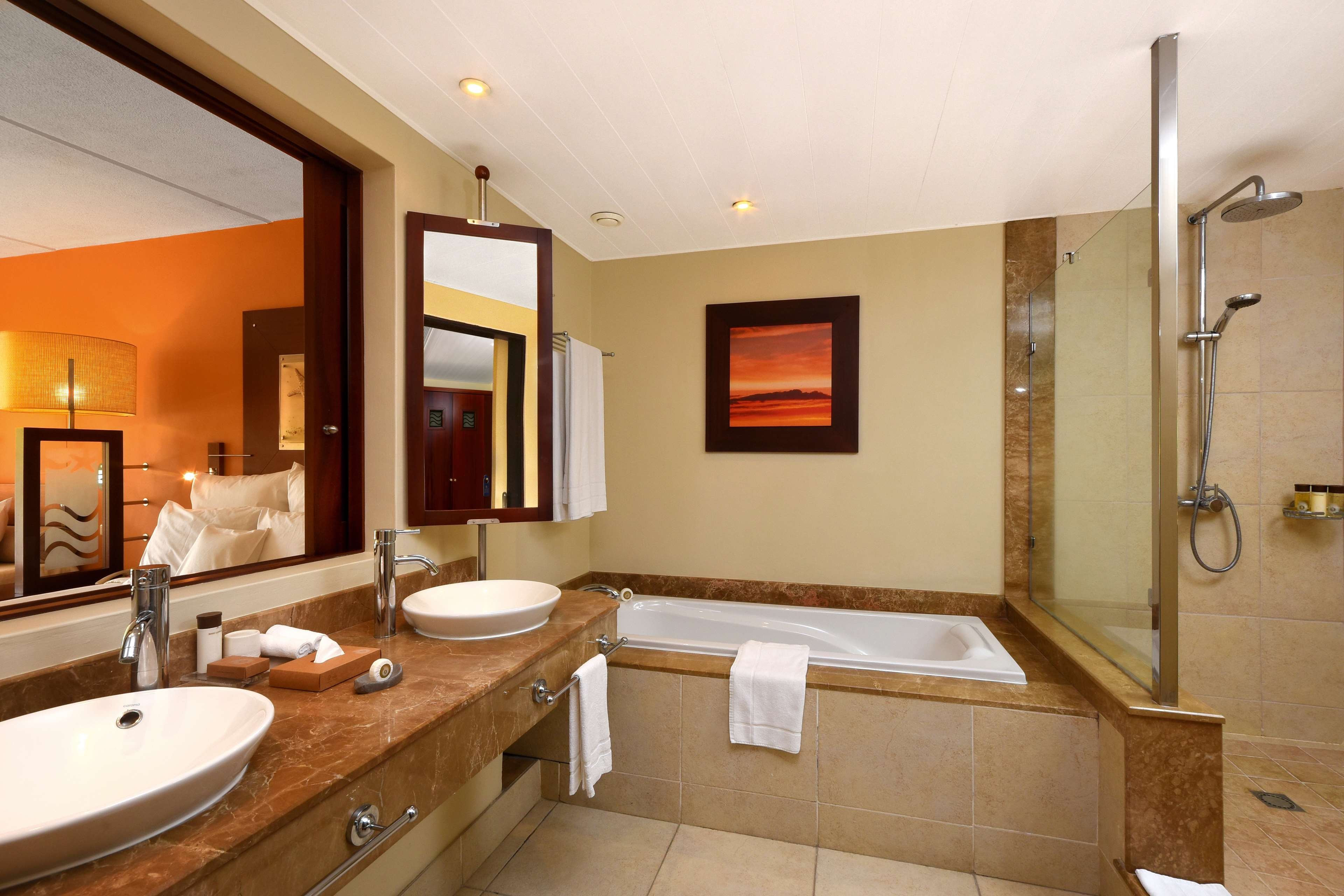 VICTORIA BEACHCOMBER RESORT AND SPA-guestroom-Superior First Floor Room Bathroom.jpg