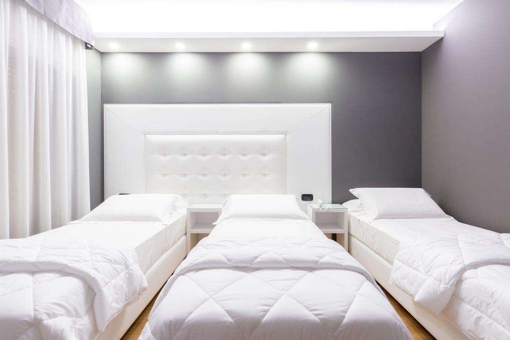 REGGIA SUITE SPA HOTEL - CASAPULLA-guestroom-GUEST ROOM.jpg