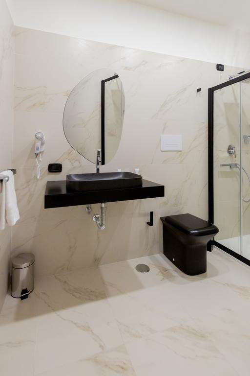REGGIA SUITE SPA HOTEL - CASAPULLA-guestroom-GUEST BATHROOM.jpg
