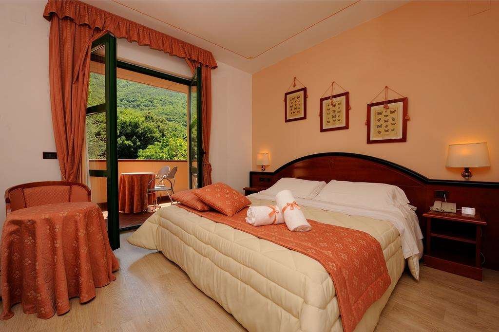 GUESIA VILLAGE HOTEL AND SPA-guestroom-GUEST ROOM.jpg