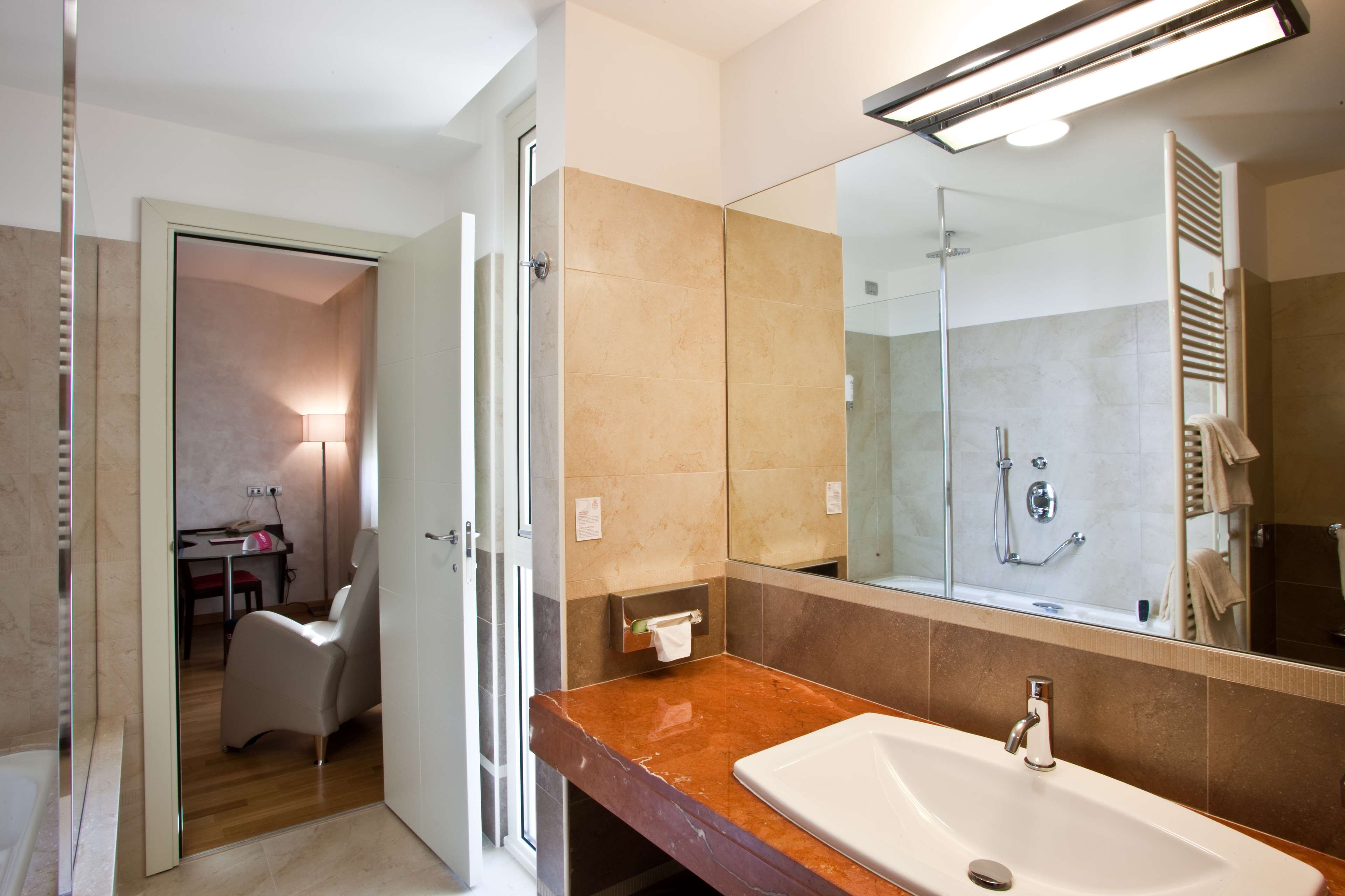 BREAKING BUSINESS HOTEL-guestroom-GUEST BATHROOM.jpg