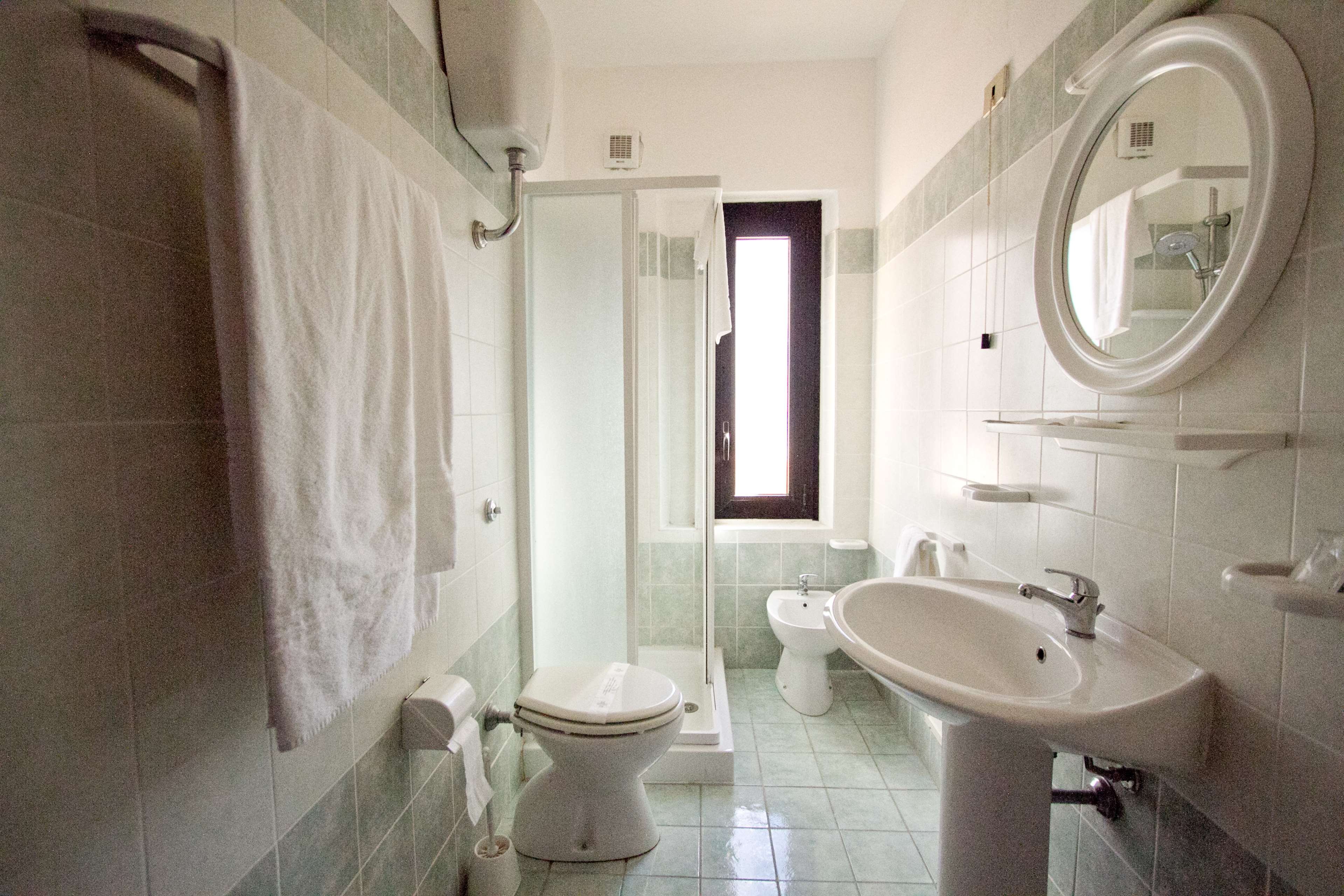 HOTEL DON PEDRO - PORTOSCUSO-guestroom-GUEST BATHROOM.jpg