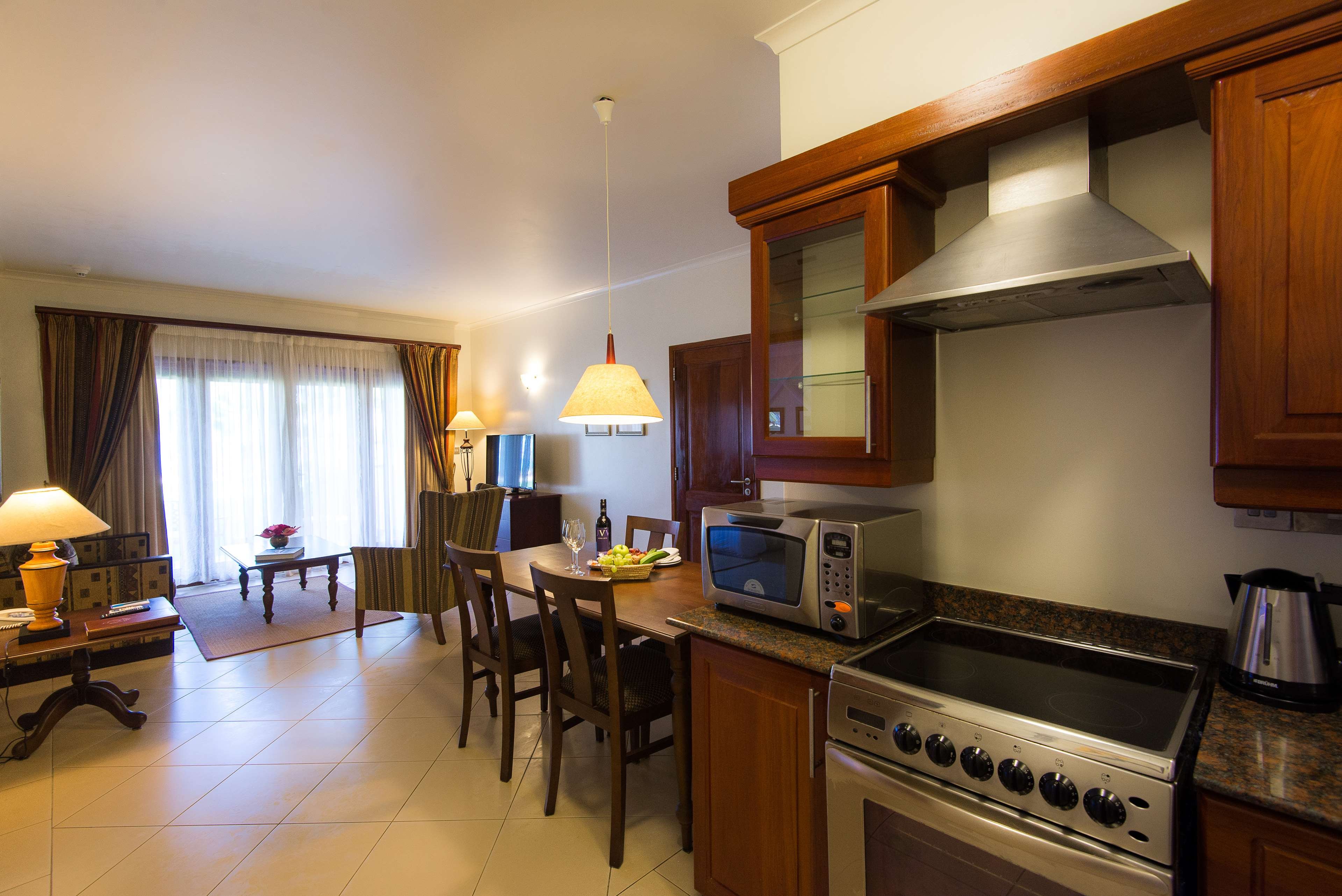 WHITE SANDS RESORT AND CONFERENCE C-guestroom-Bedroom Apartment Living Room.jpg
