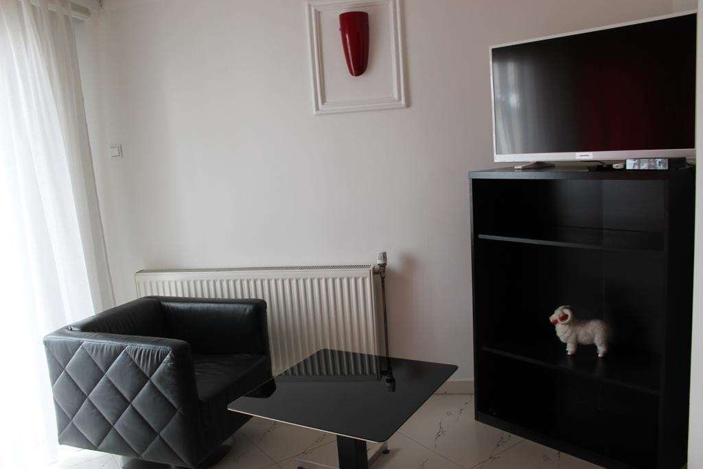 SARA HOTEL-guestroom-GUEST ROOM LIVING ROOM.jpg