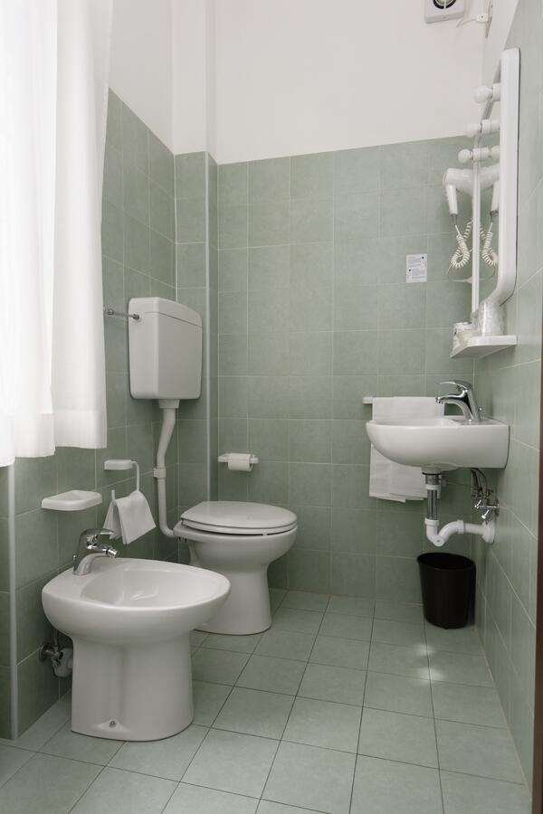 HOTEL RAVENNA-guestroom-GUEST BATHROOM.jpg